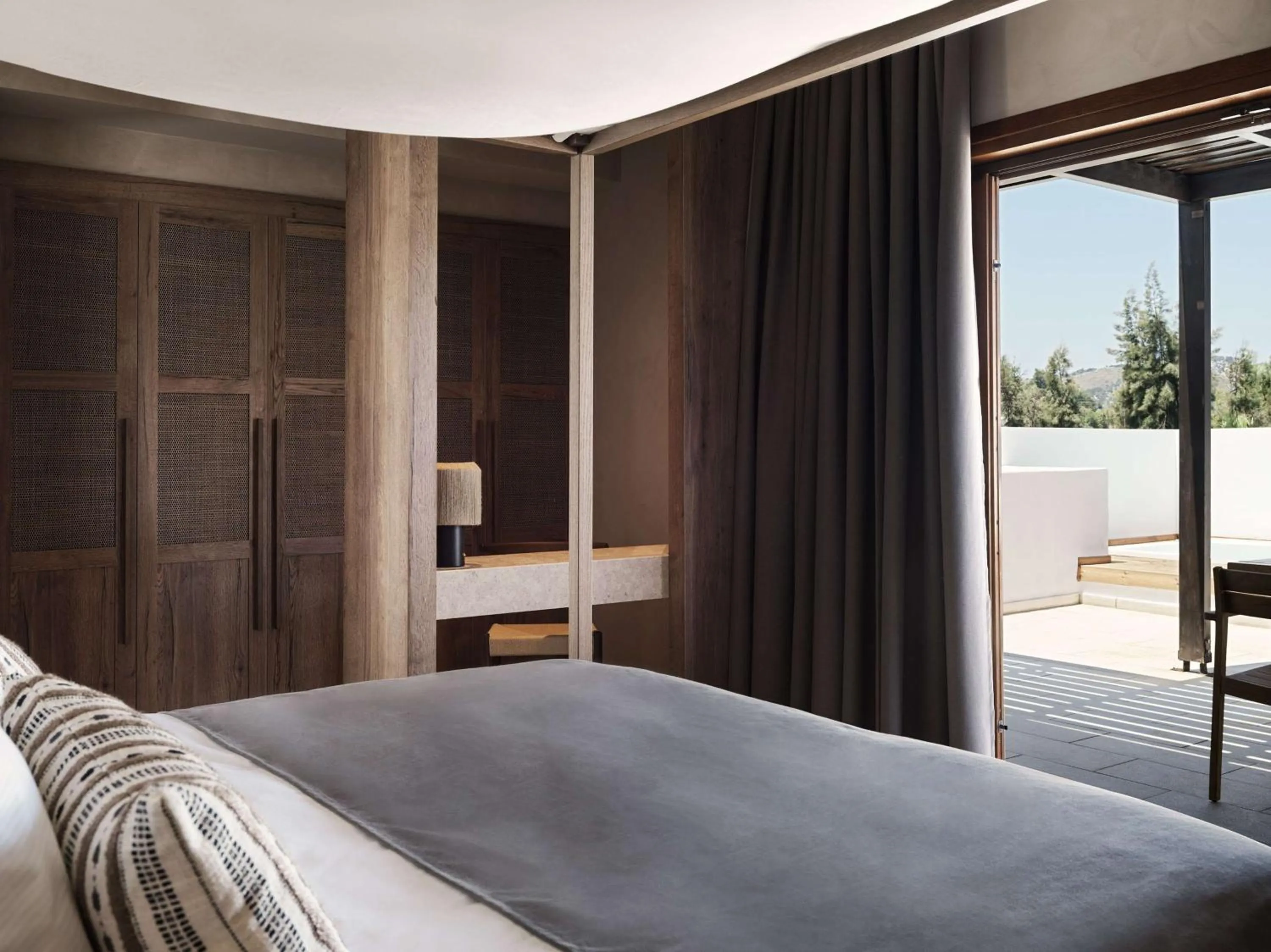 Bed in Lindian Village, Curio Collection by Hilton