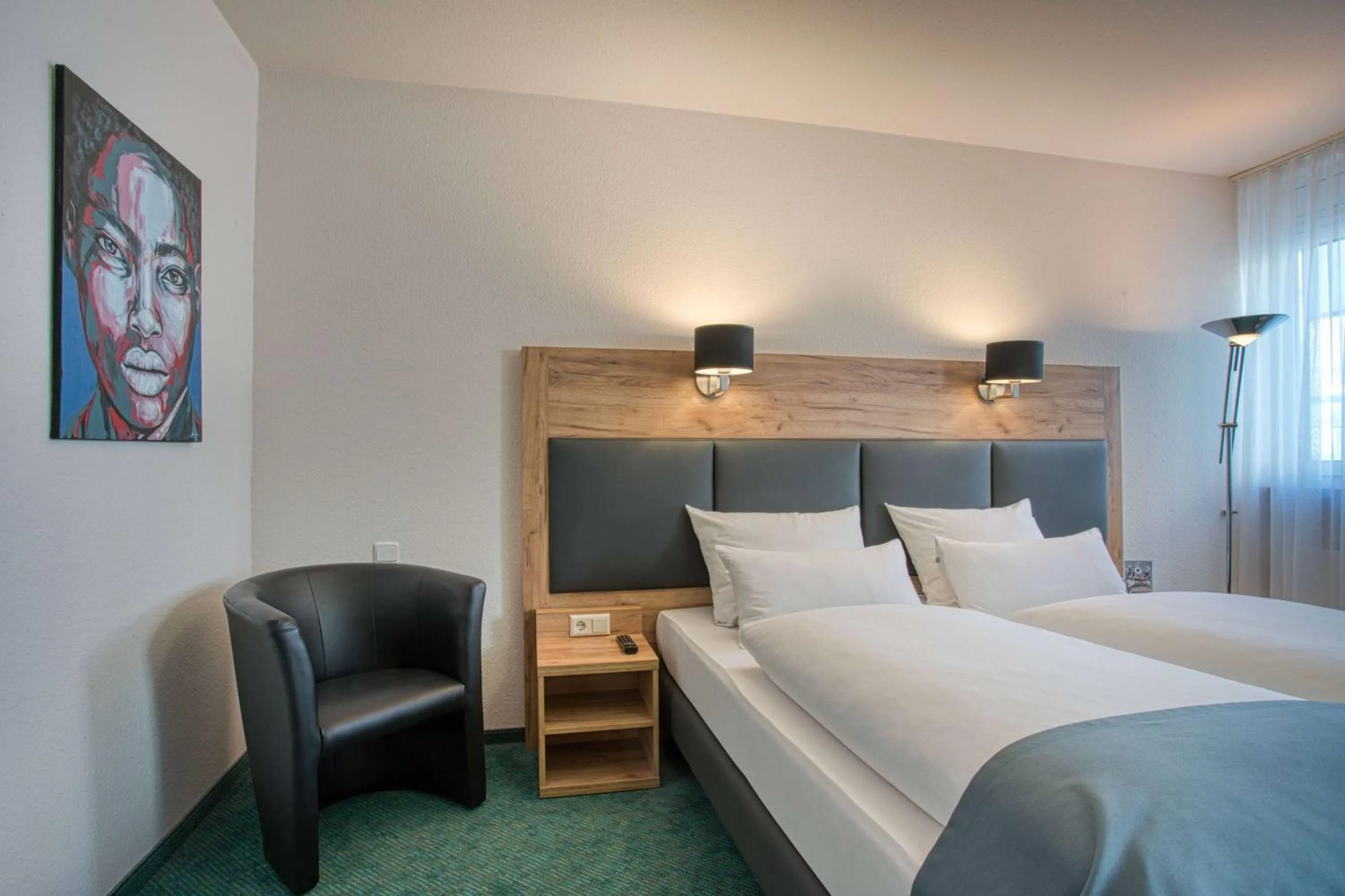 Photo of the whole room, Bed in Centro Hotel Böblingen, Trademark Collection by Wyndham