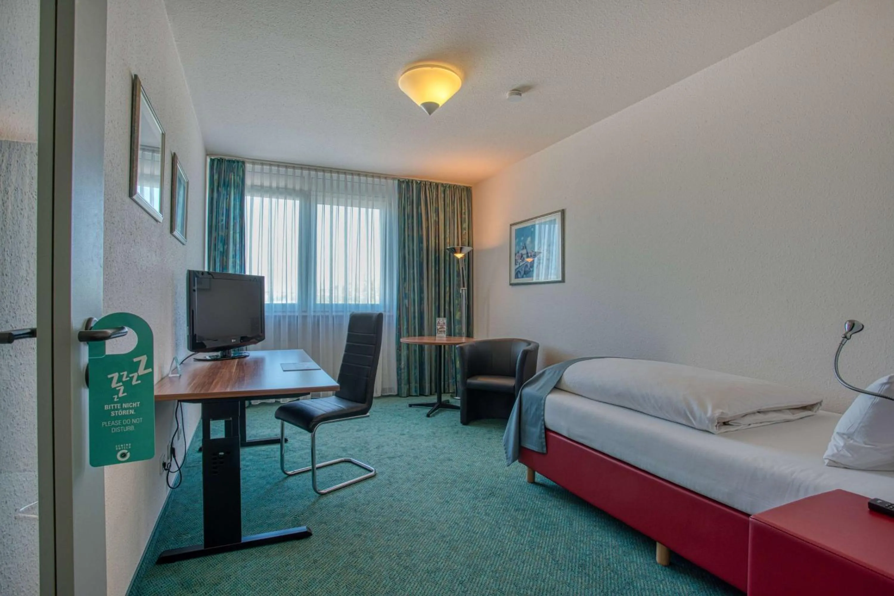 Photo of the whole room, Bed in Centro Hotel Böblingen, Trademark Collection by Wyndham
