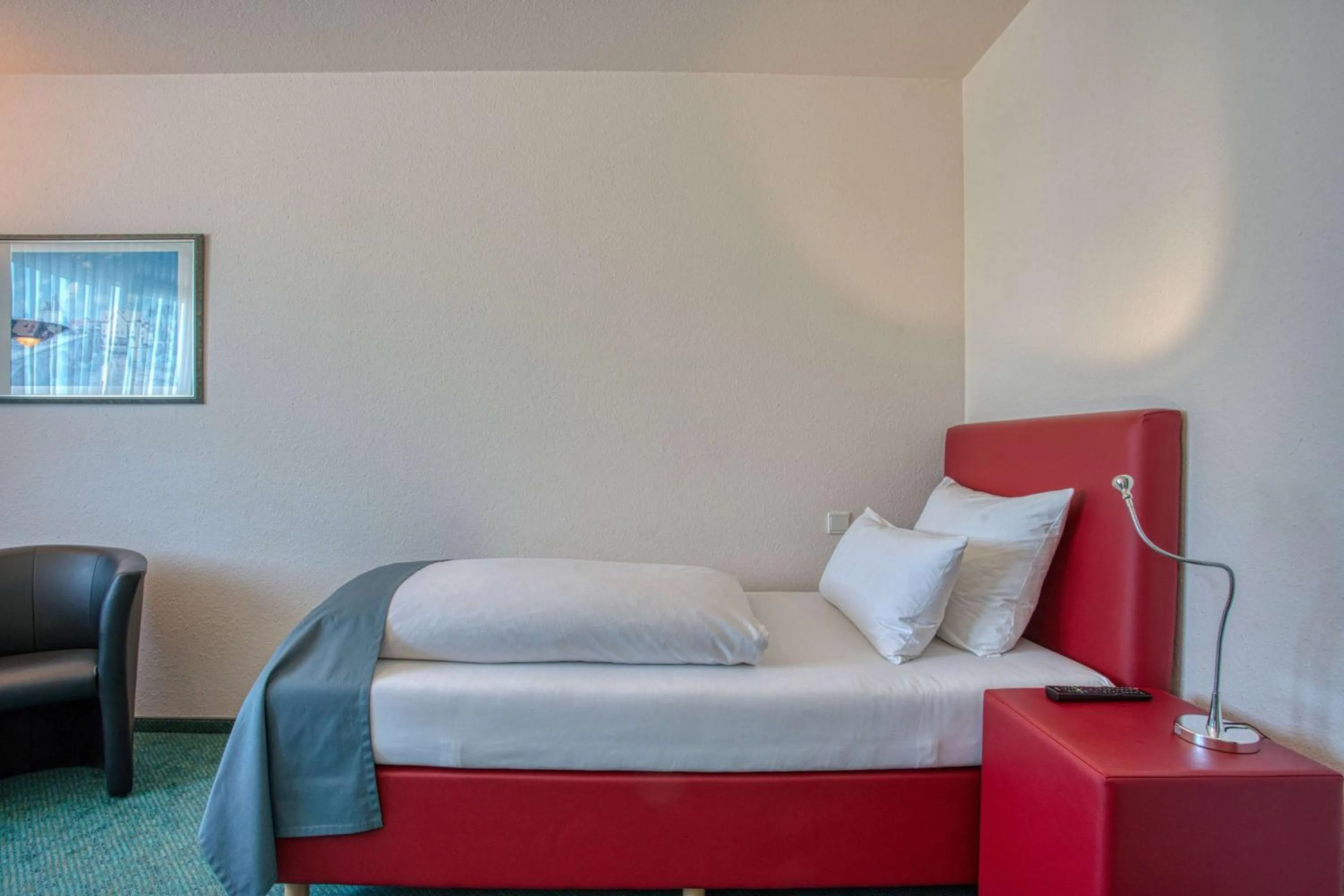 Photo of the whole room, Bed in Centro Hotel Böblingen, Trademark Collection by Wyndham
