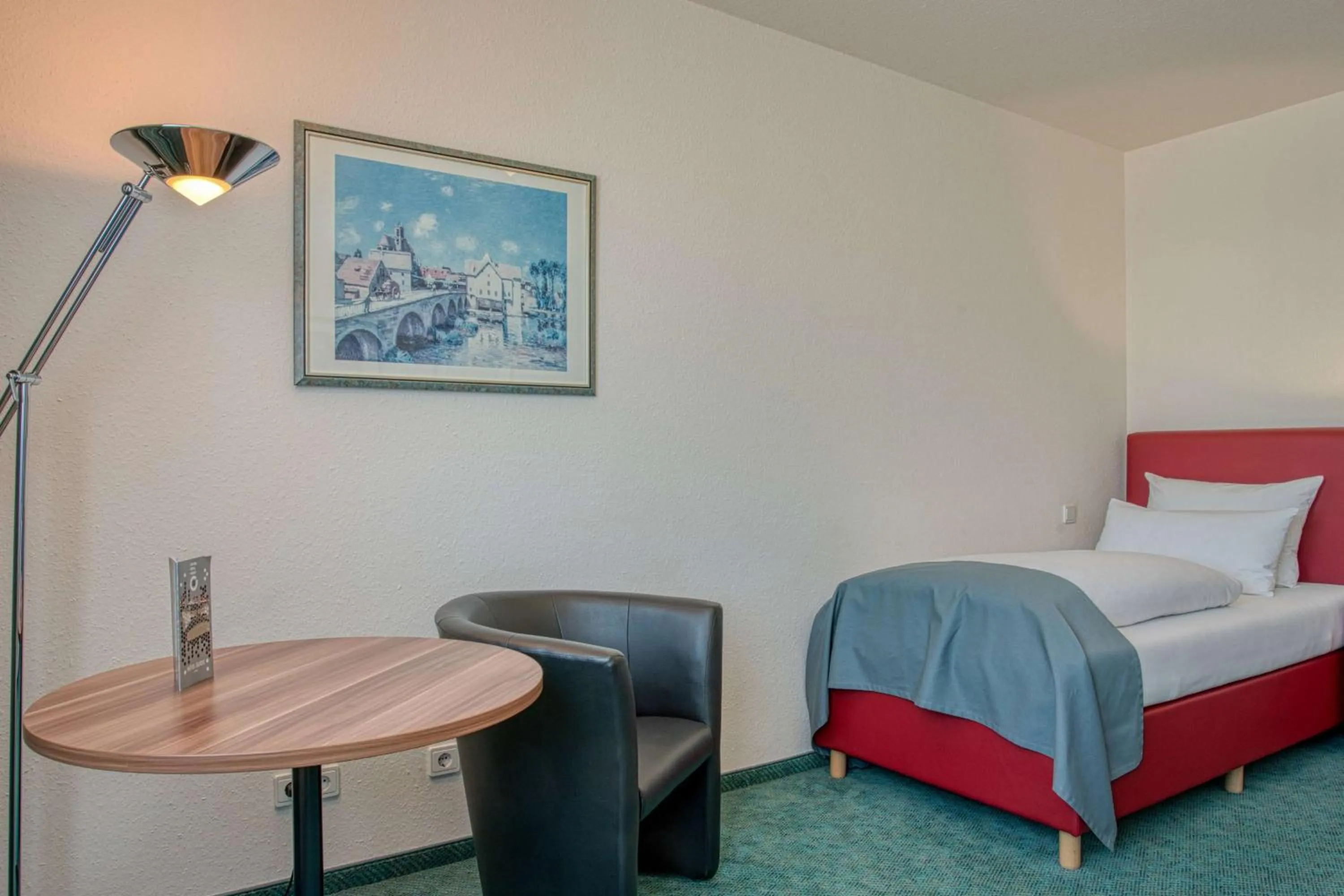 Photo of the whole room, Bed in Centro Hotel Böblingen, Trademark Collection by Wyndham