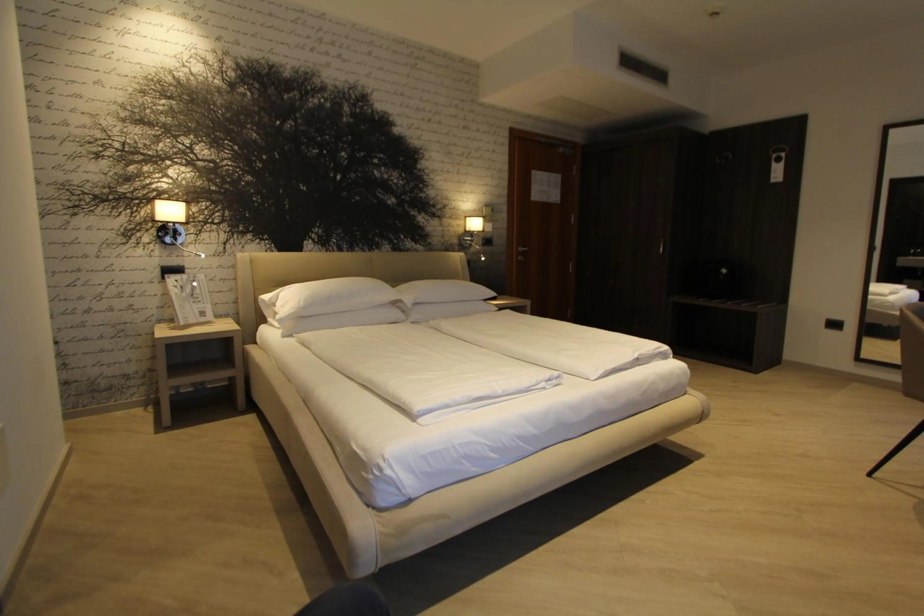 Bed in Hotel Villa Rosa