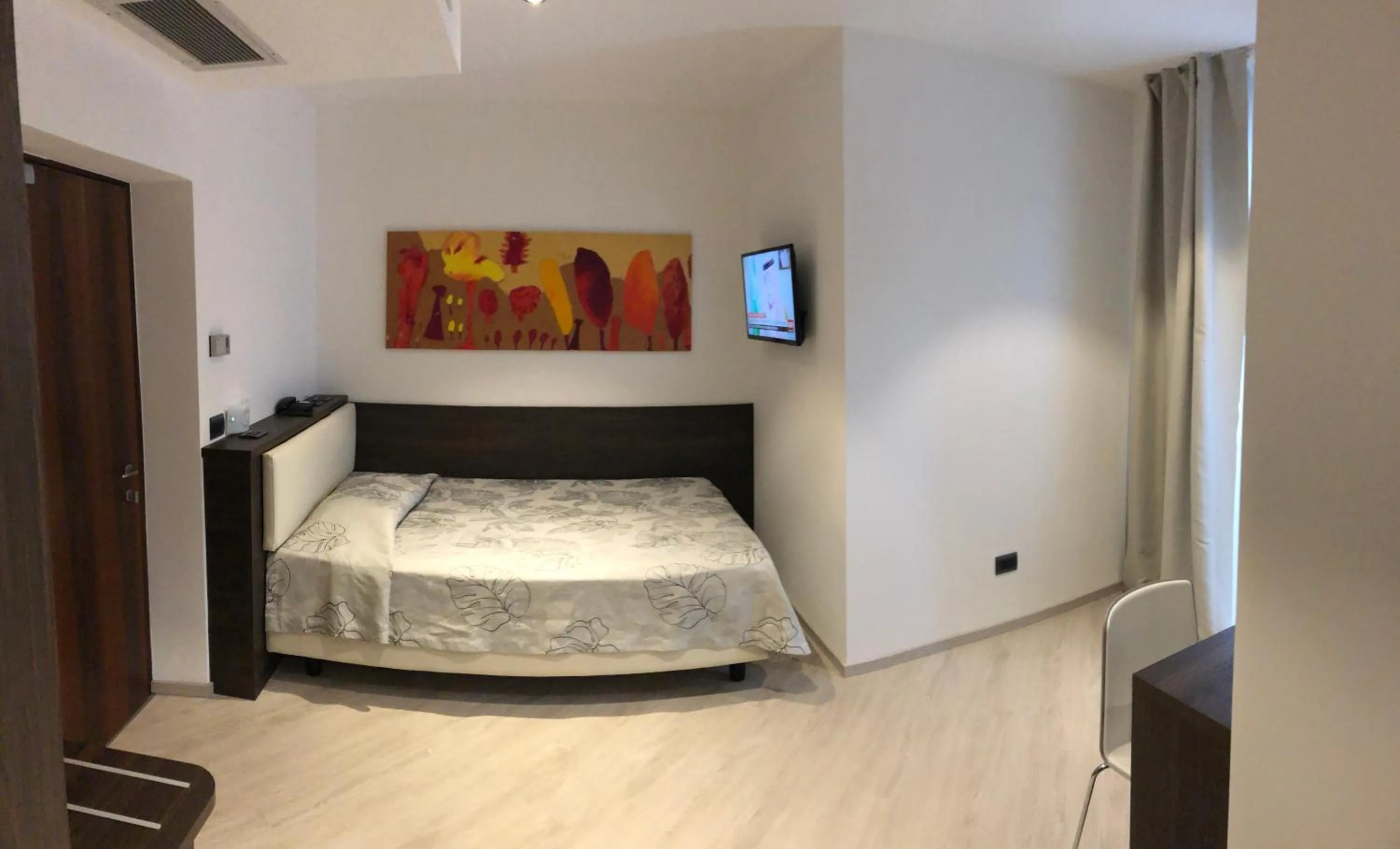 Bed in Hotel Villa Rosa