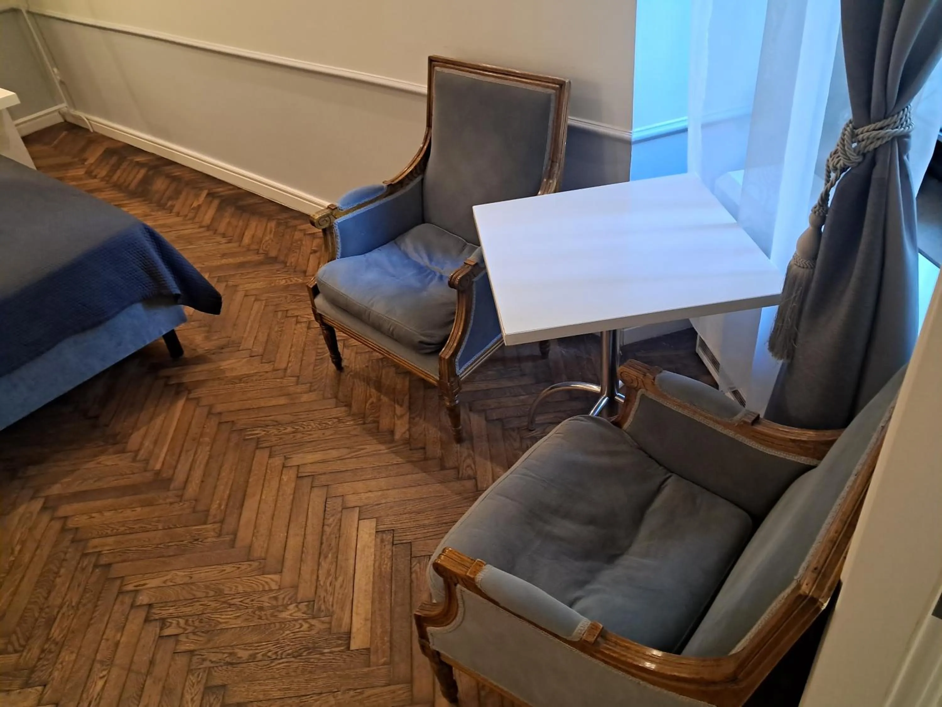 Seating area in Angel House Aparthotel