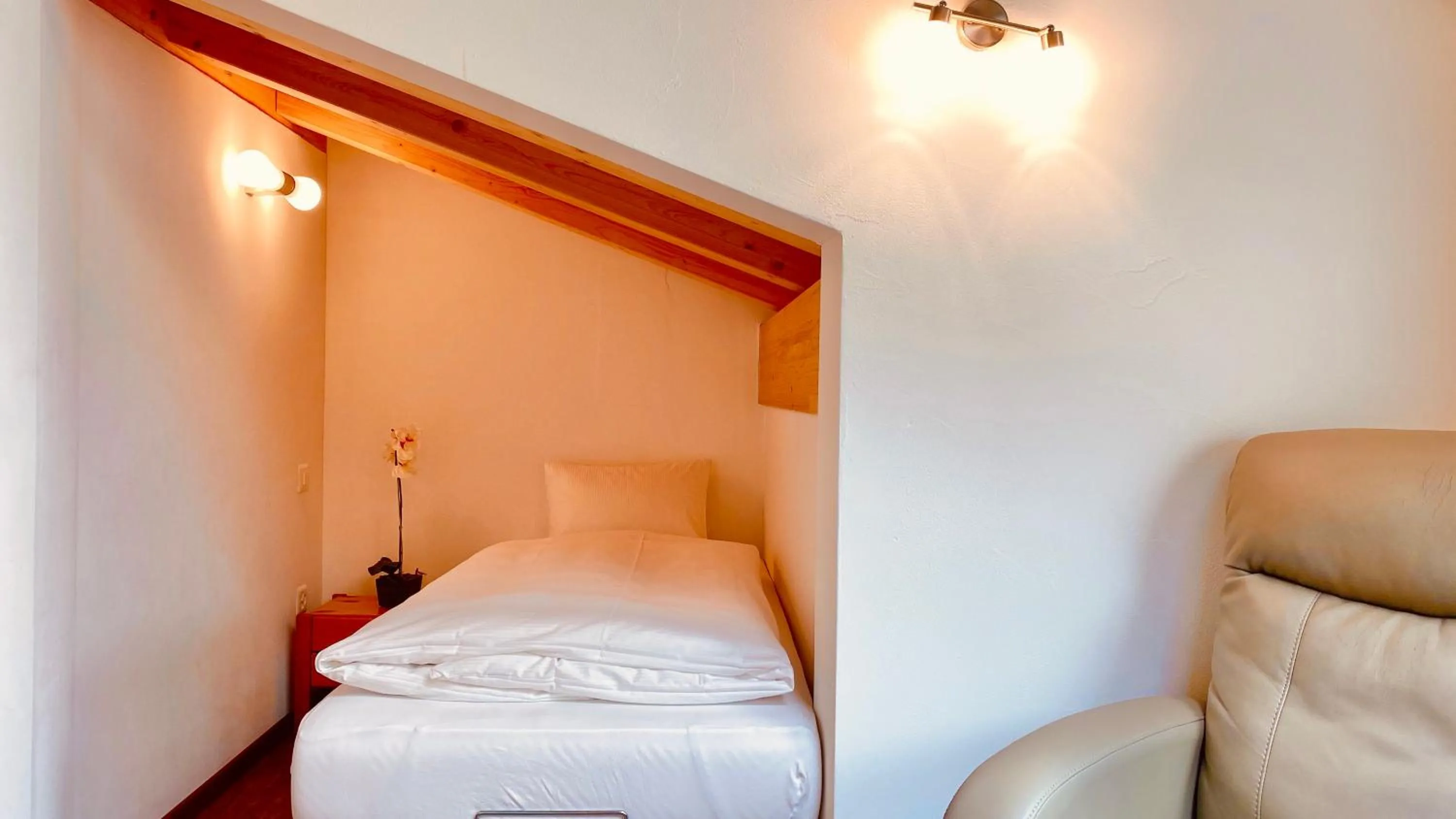 Bed in Hotel Capricorn