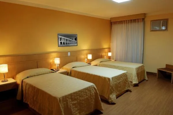 Bed in Hotel Pouso Real