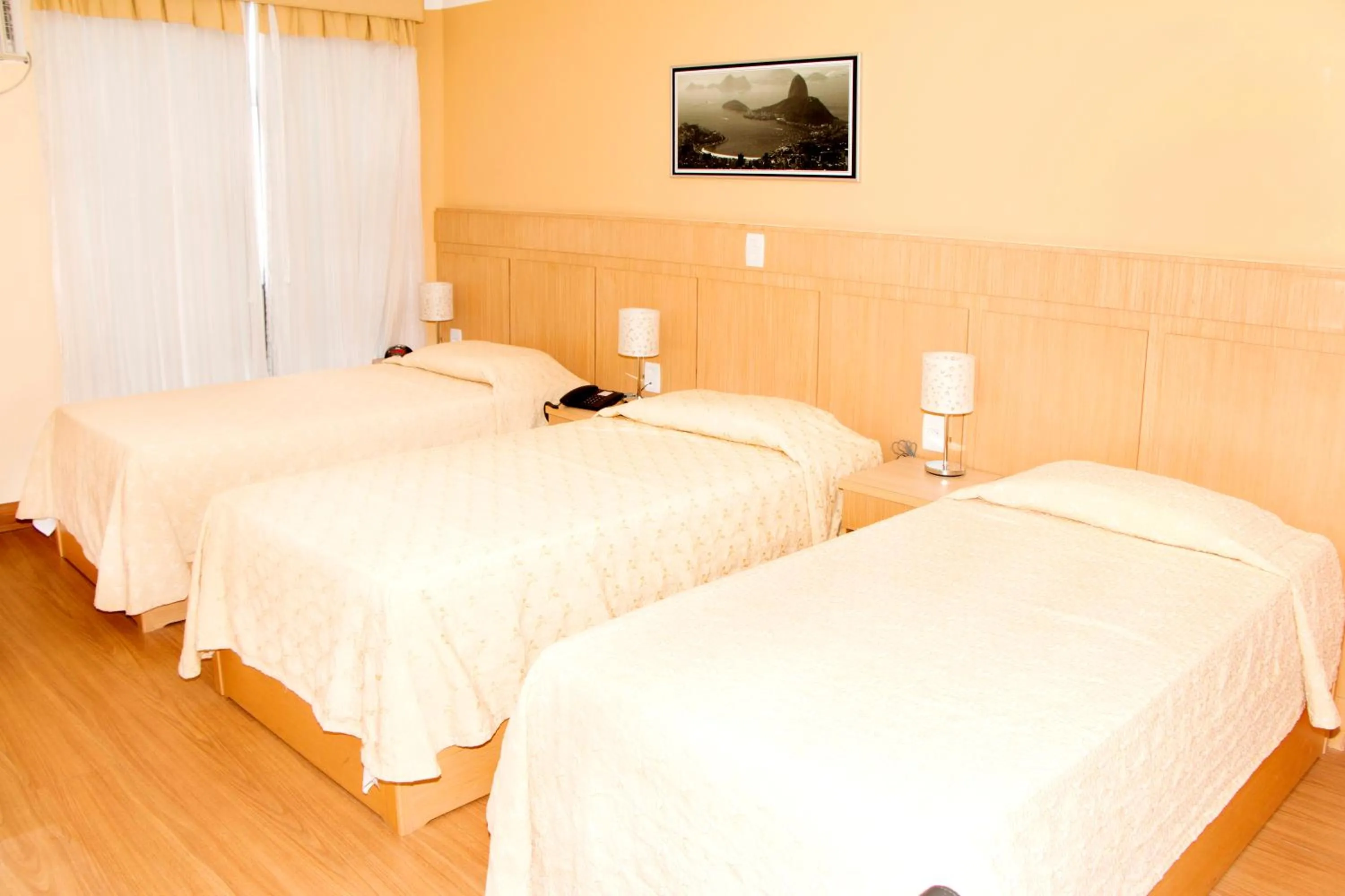 Bed in Hotel Pouso Real