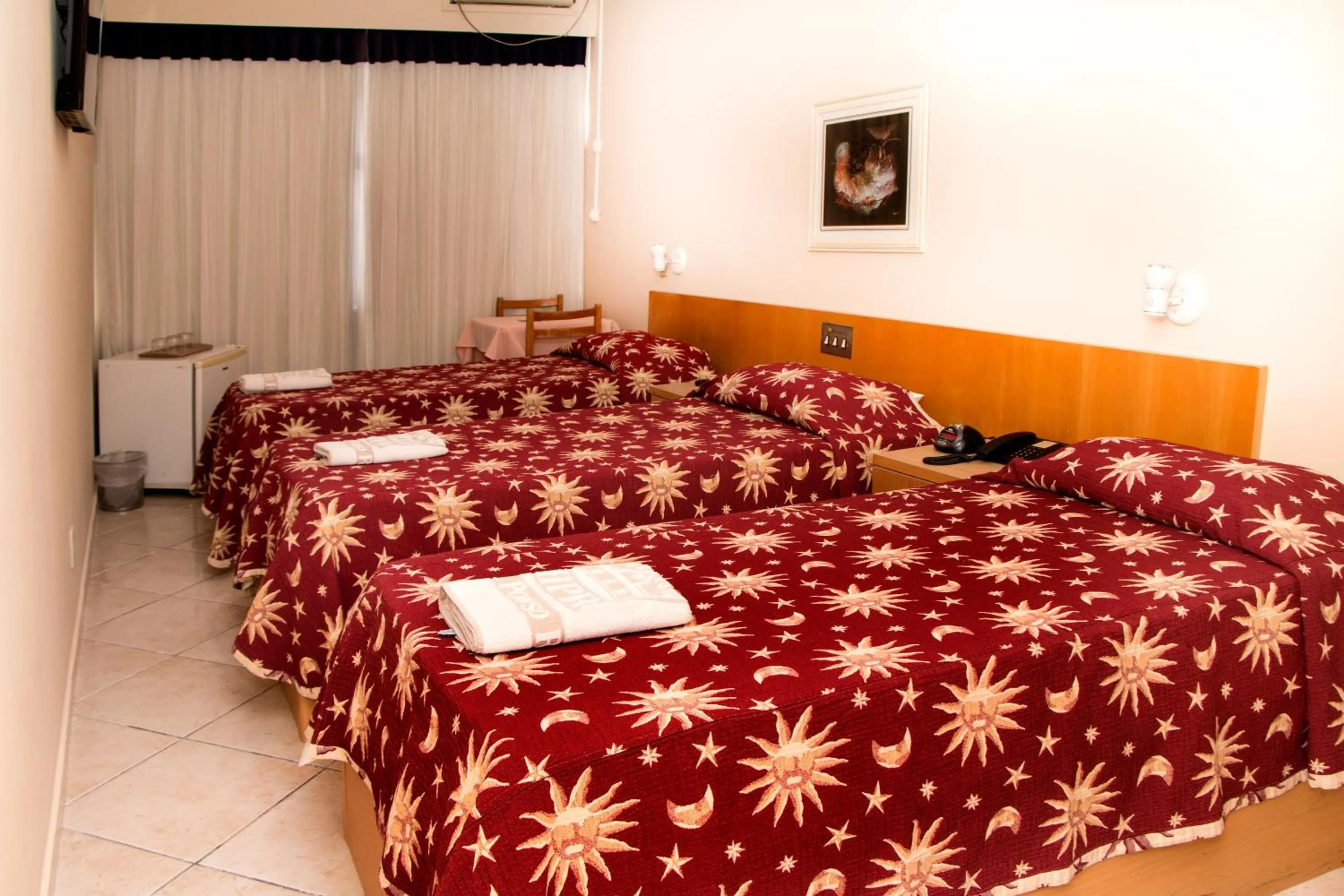 Bed in Hotel Pouso Real