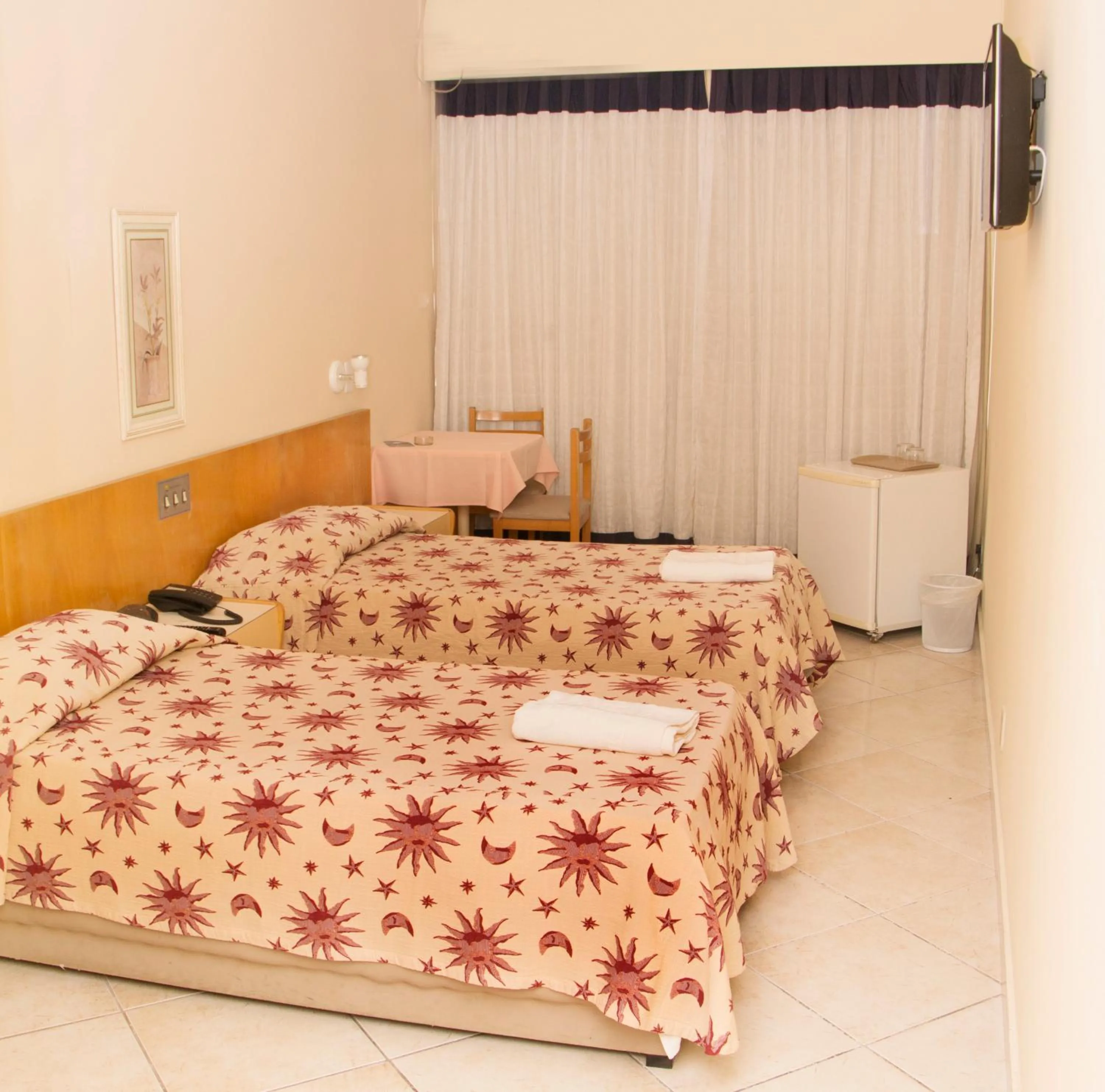 Bed in Hotel Pouso Real