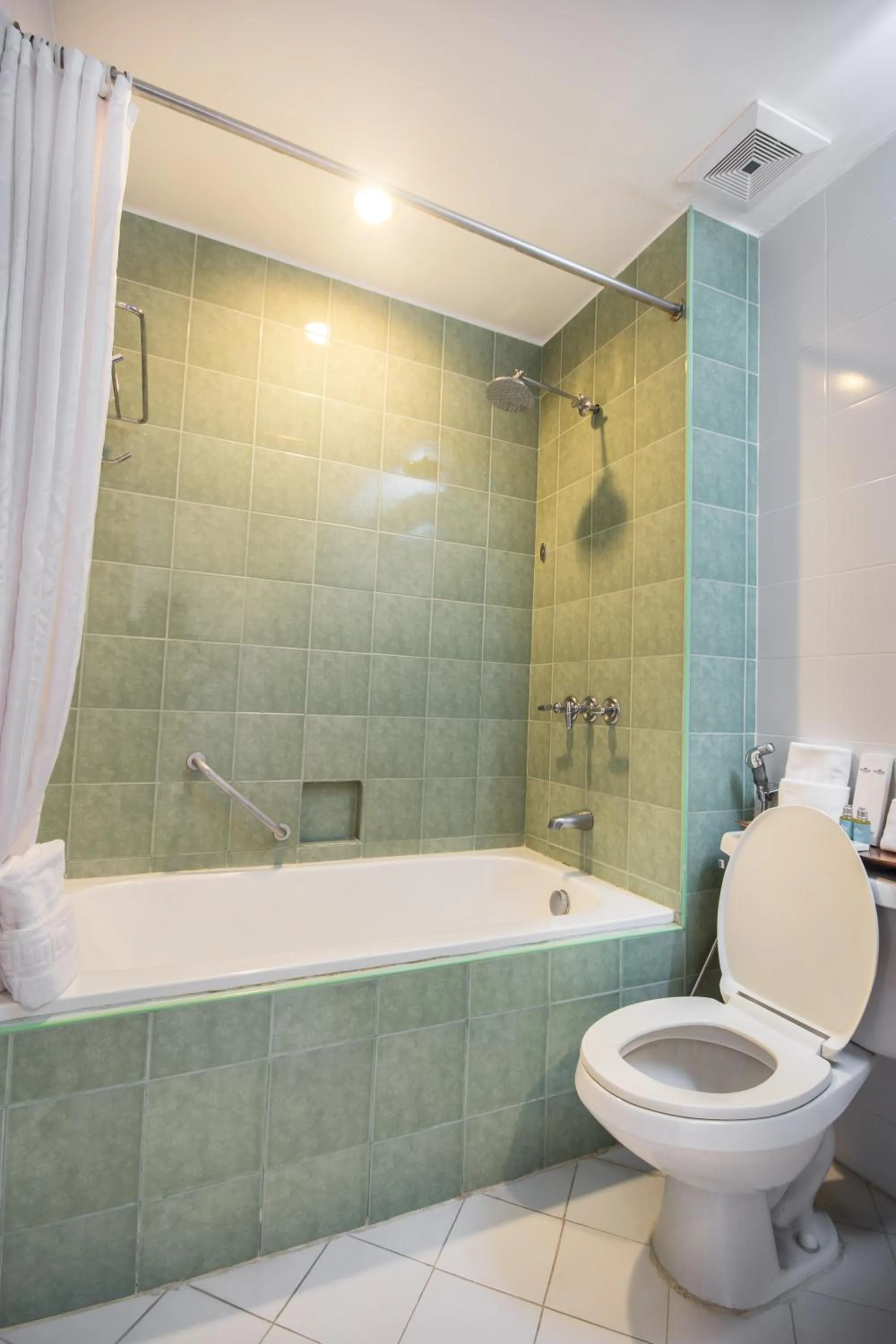 Bathroom in Microtel by Wyndham Eagle Ridge