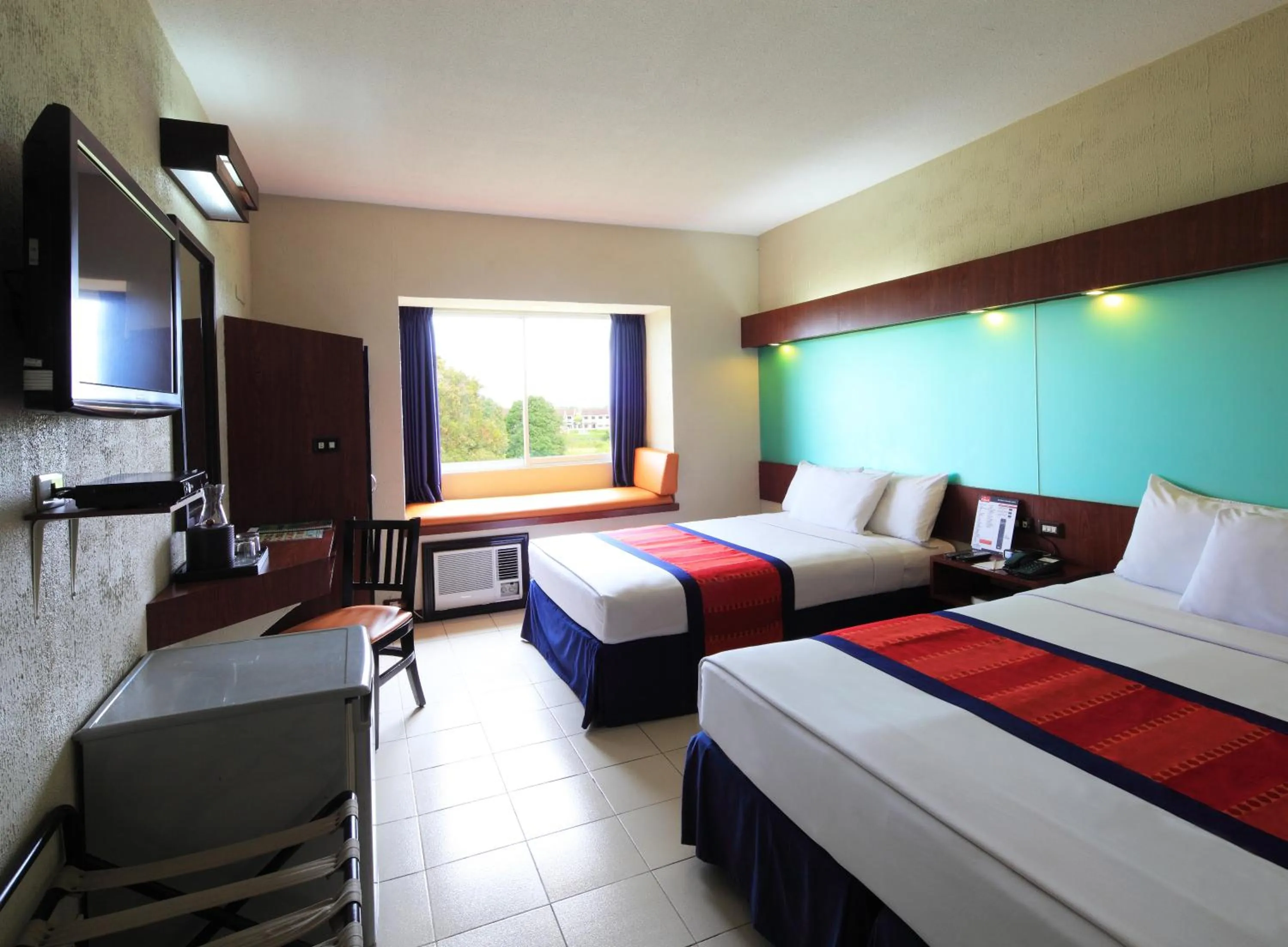 Bedroom, Bed in Microtel by Wyndham Eagle Ridge