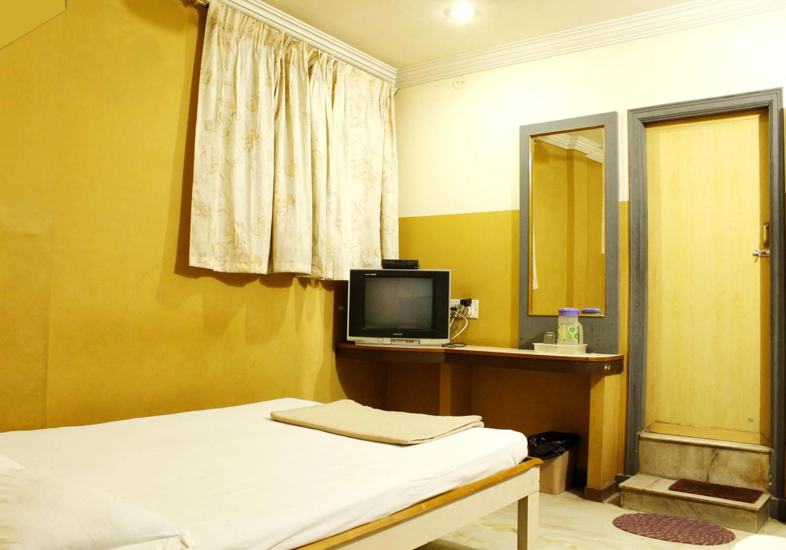 Bedroom in Greens Residency