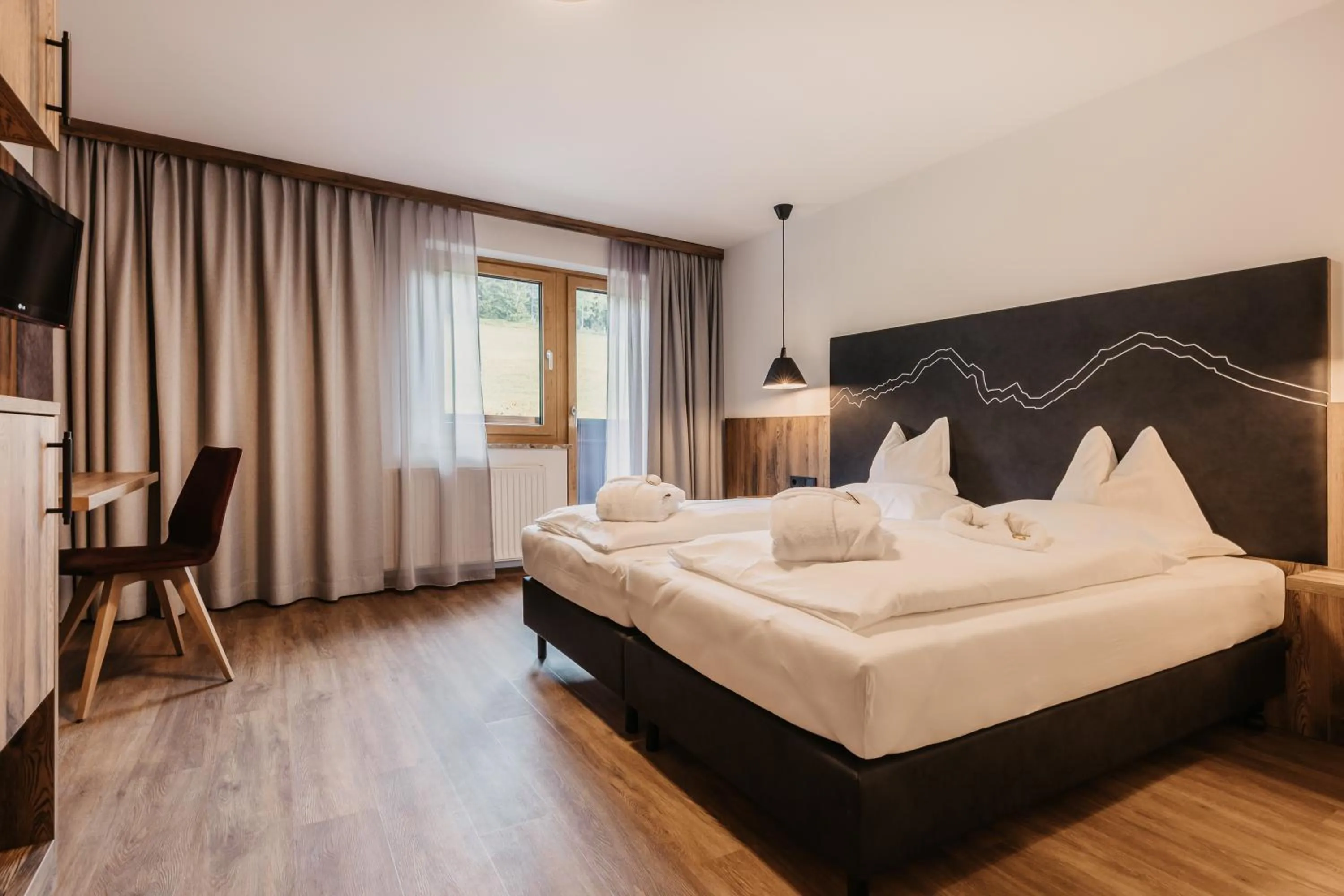 Photo of the whole room, Bed in Hotel Neubergerhof