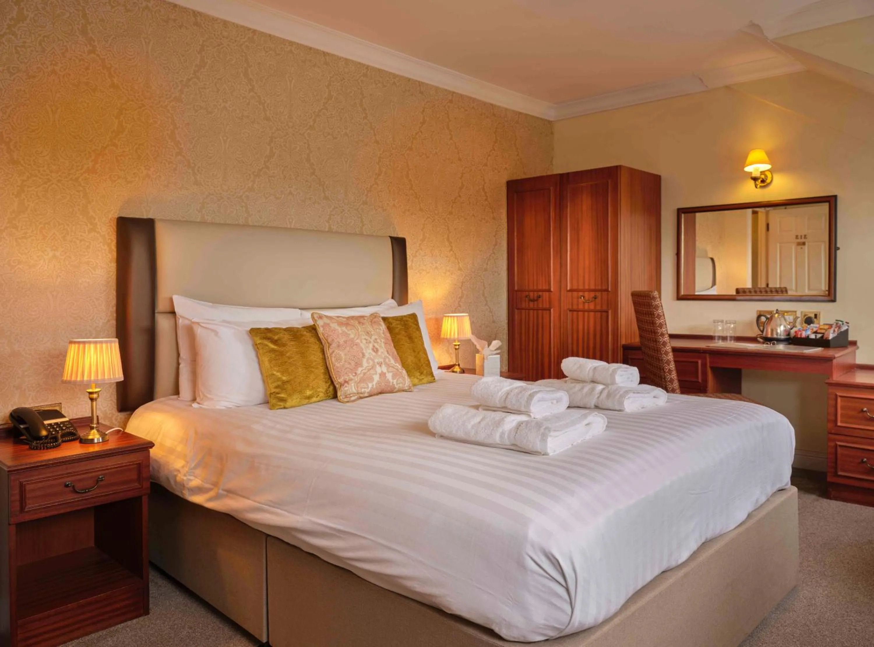 Bed in Royal Beacon Hotel