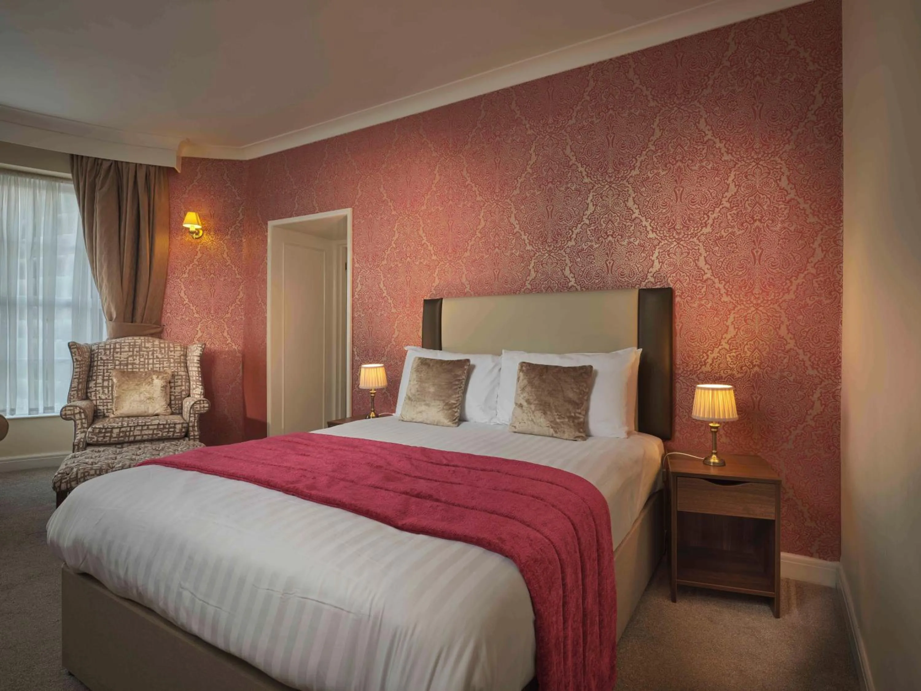 Bed in Royal Beacon Hotel