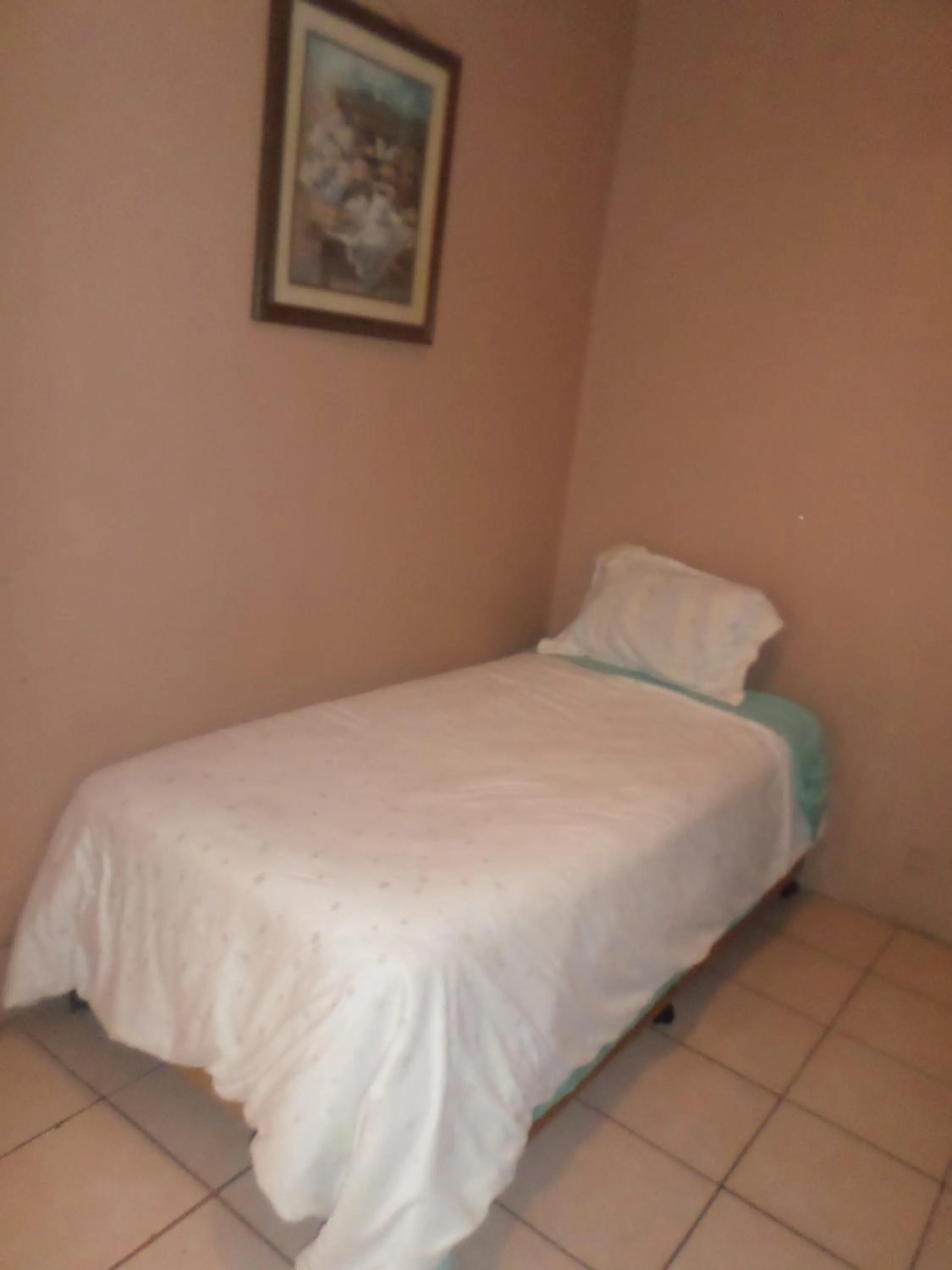 Photo of the whole room, Bed in Hospedaje Barato Mi Casita de Colores