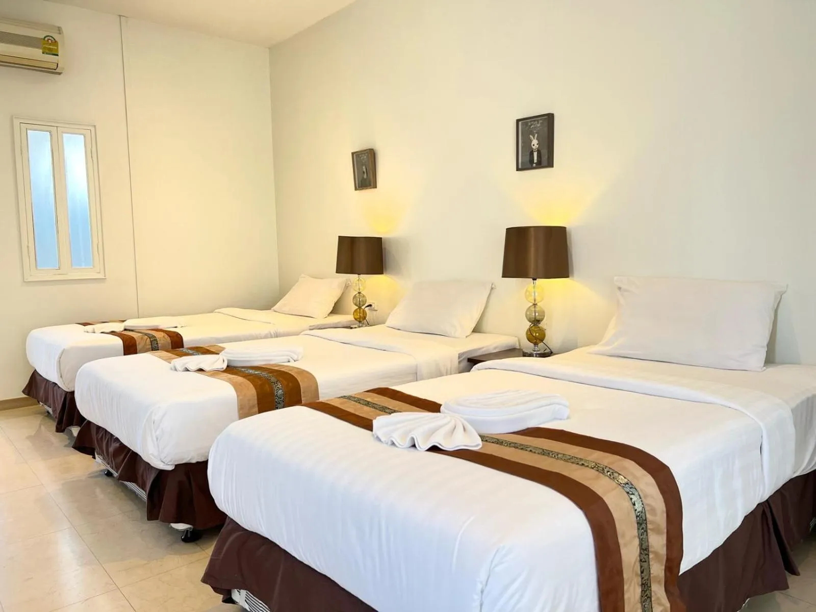 Bed in 3B Boutique Hotel