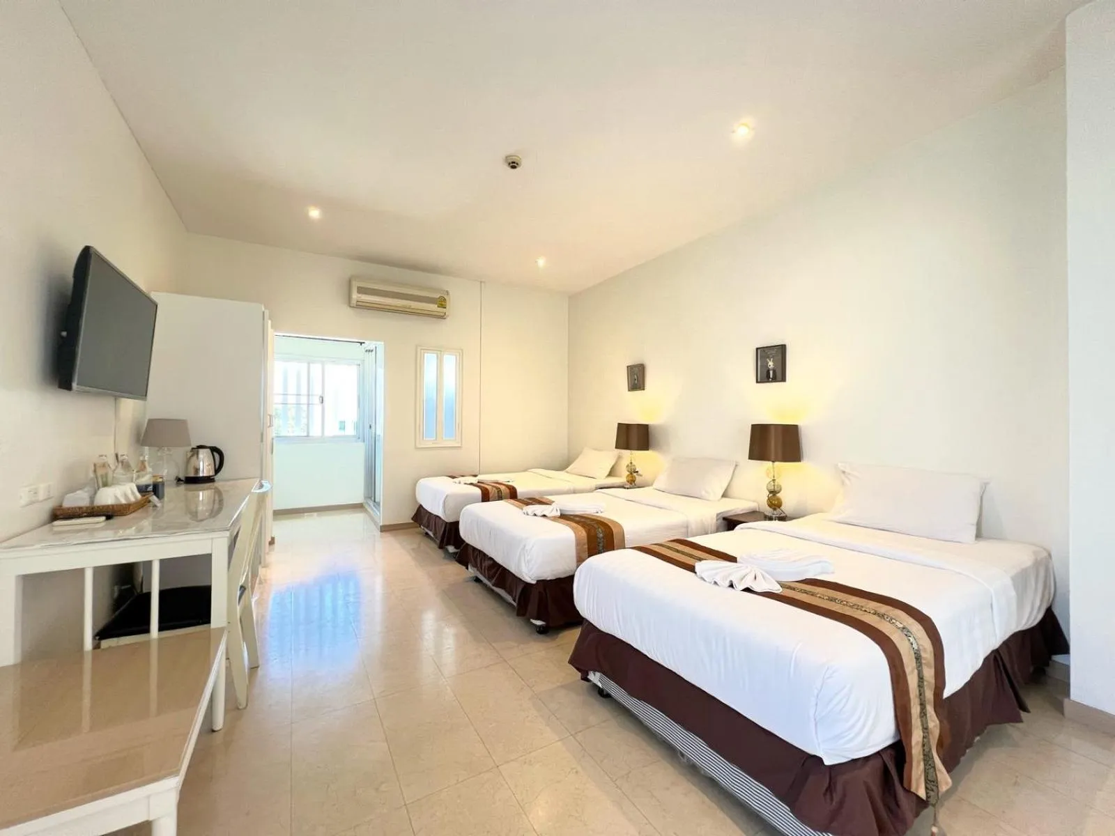 Bed in 3B Boutique Hotel