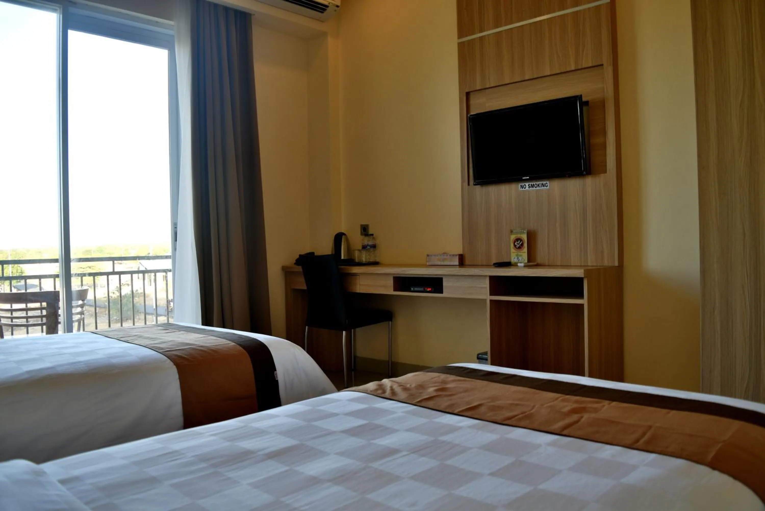 Bed in Padadita Beach Hotel