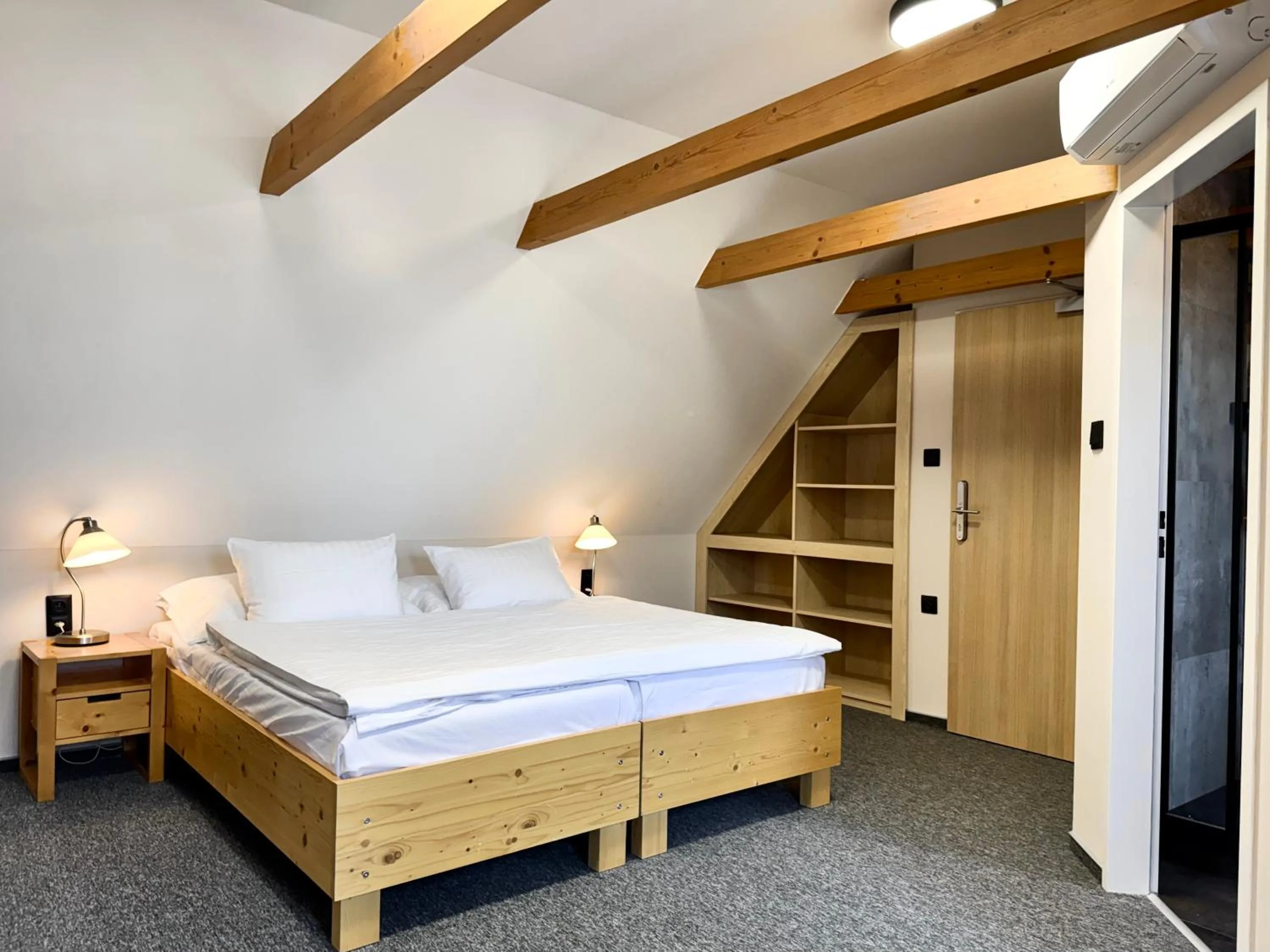 Bed in Hotel U Vlašského Dvora