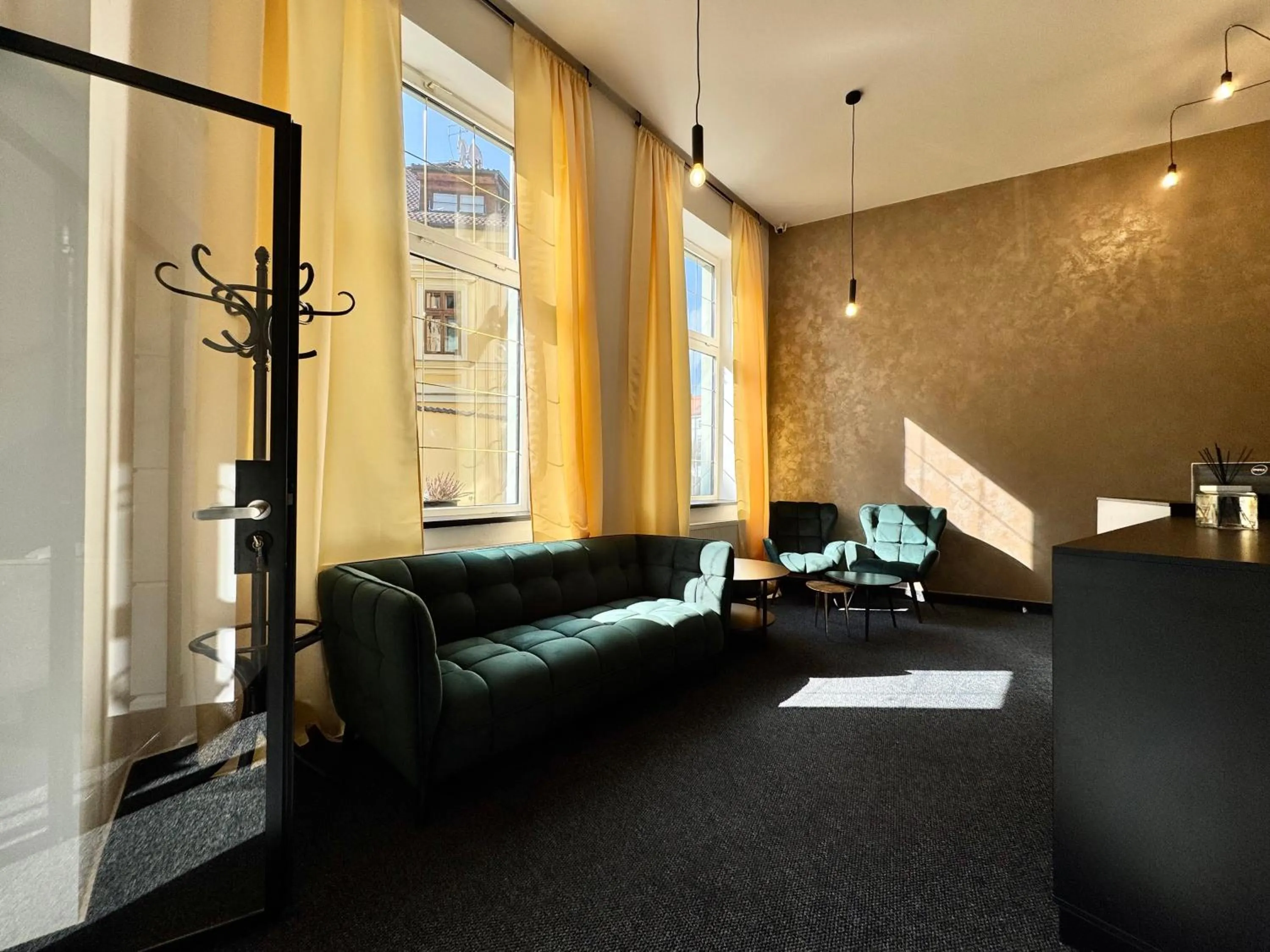 Lobby or reception in Hotel U Vlašského Dvora