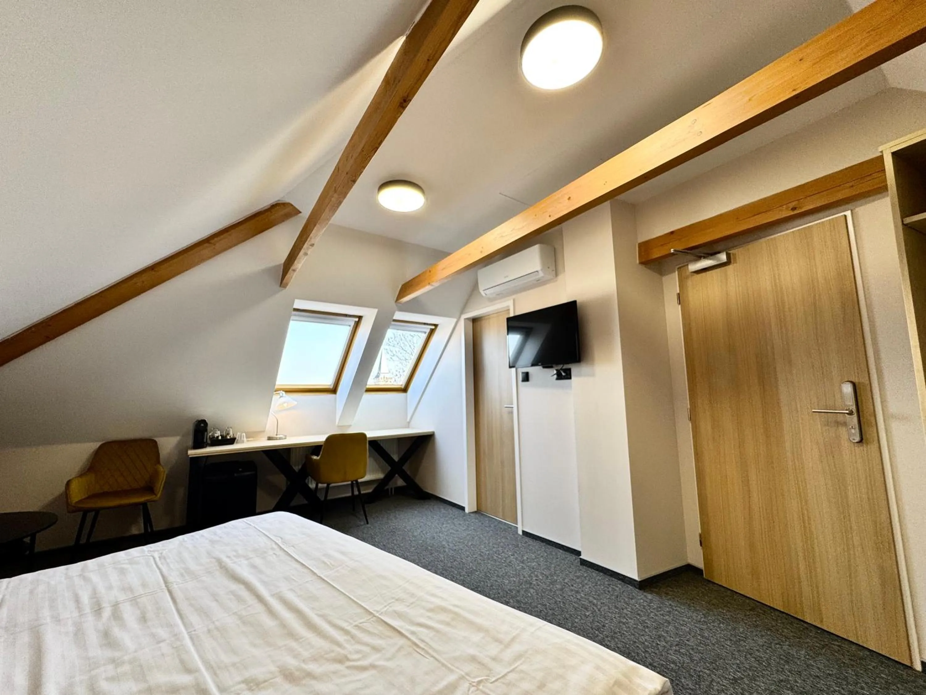 Bed in Hotel U Vlašského Dvora