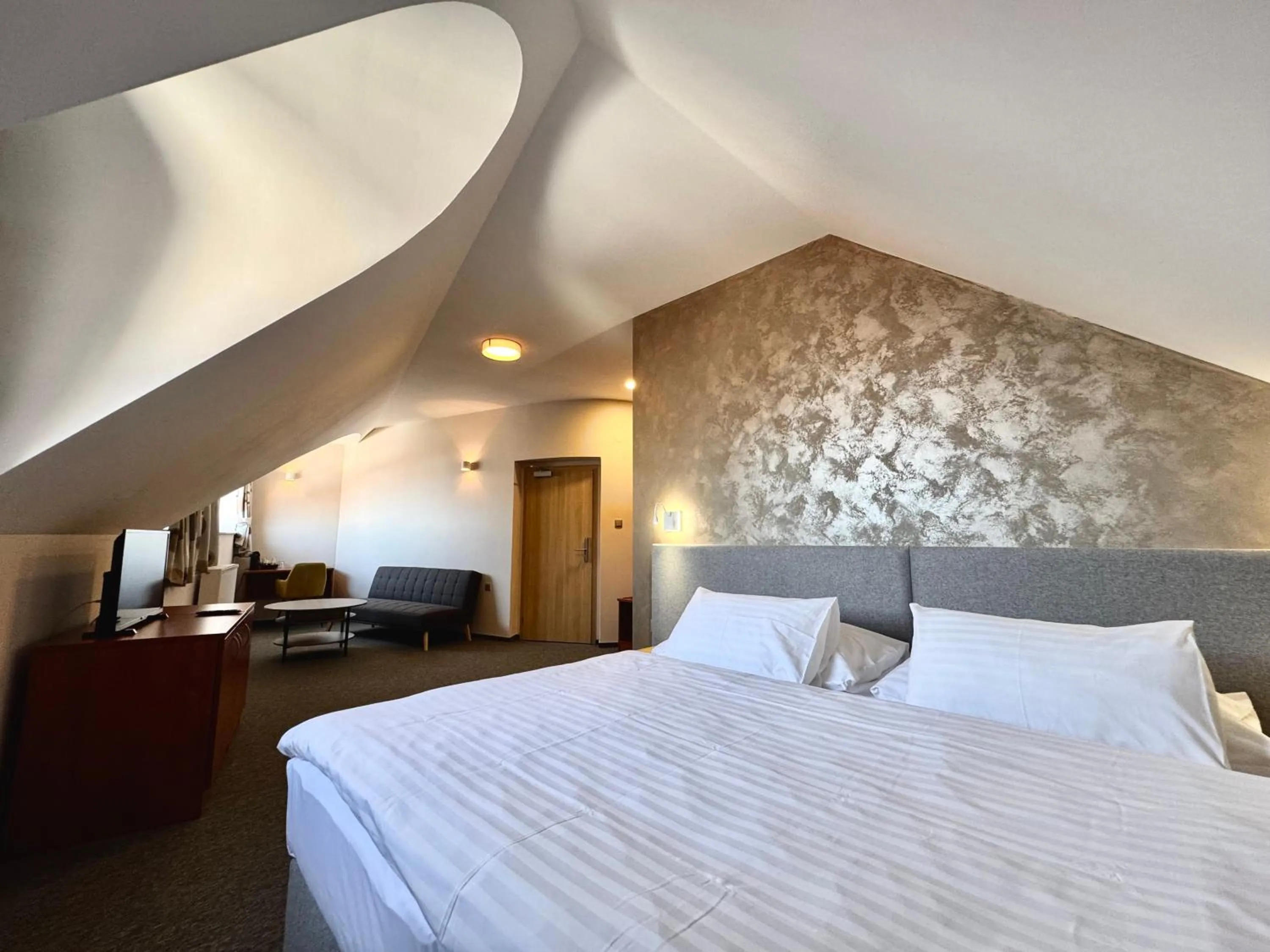 Bed in Hotel U Vlašského Dvora