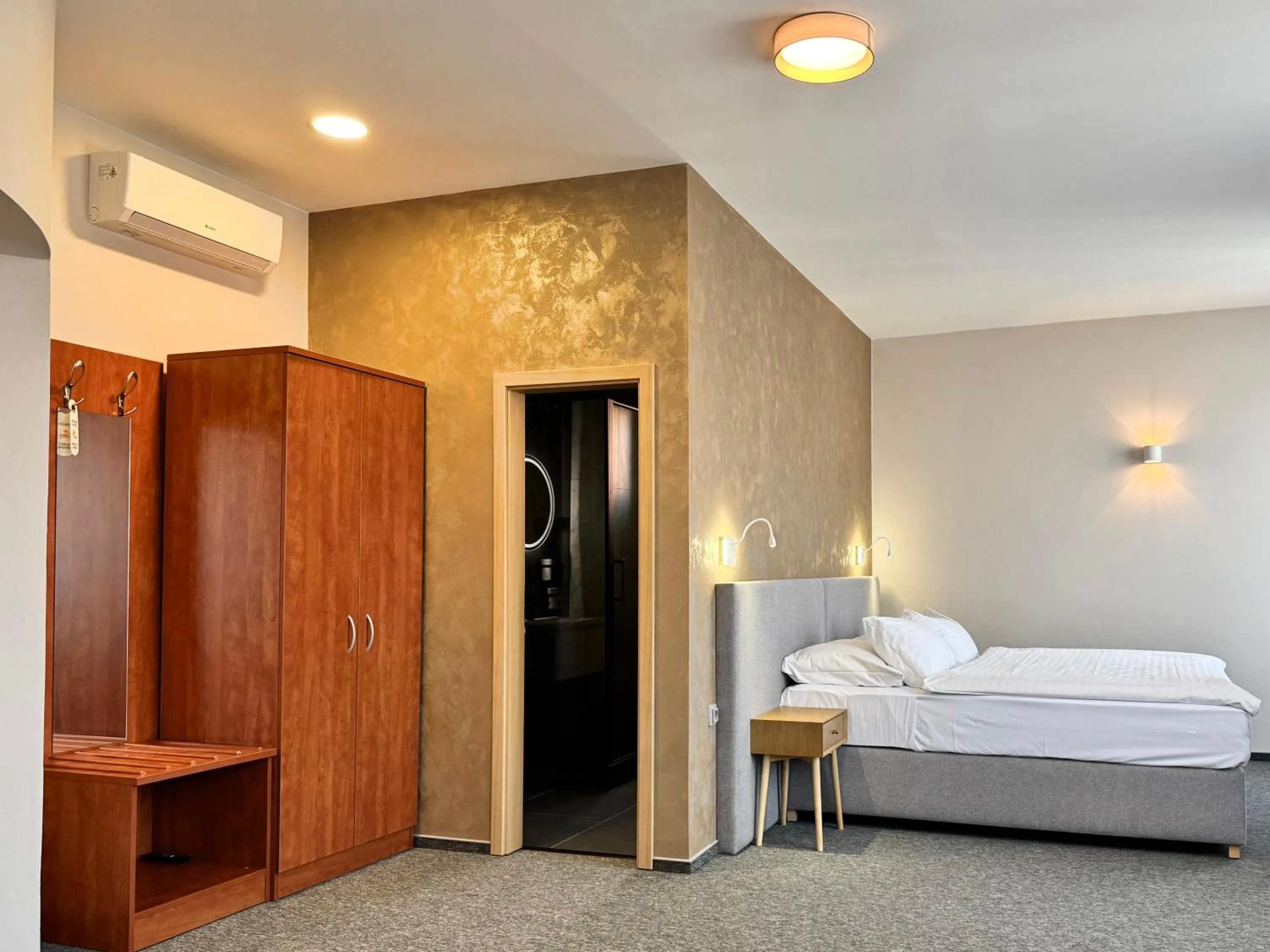 Bed in Hotel U Vlašského Dvora