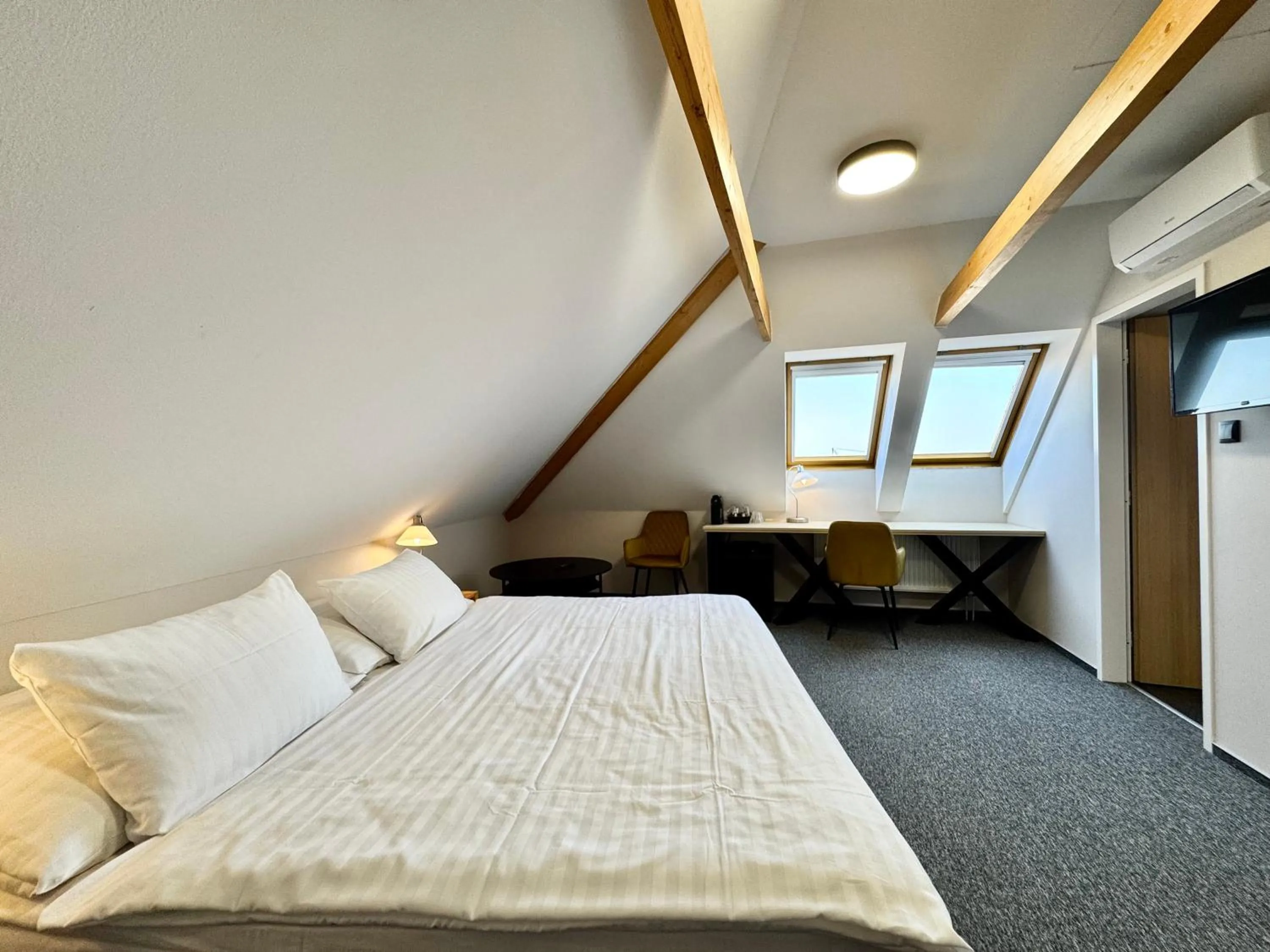 Bed in Hotel U Vlašského Dvora