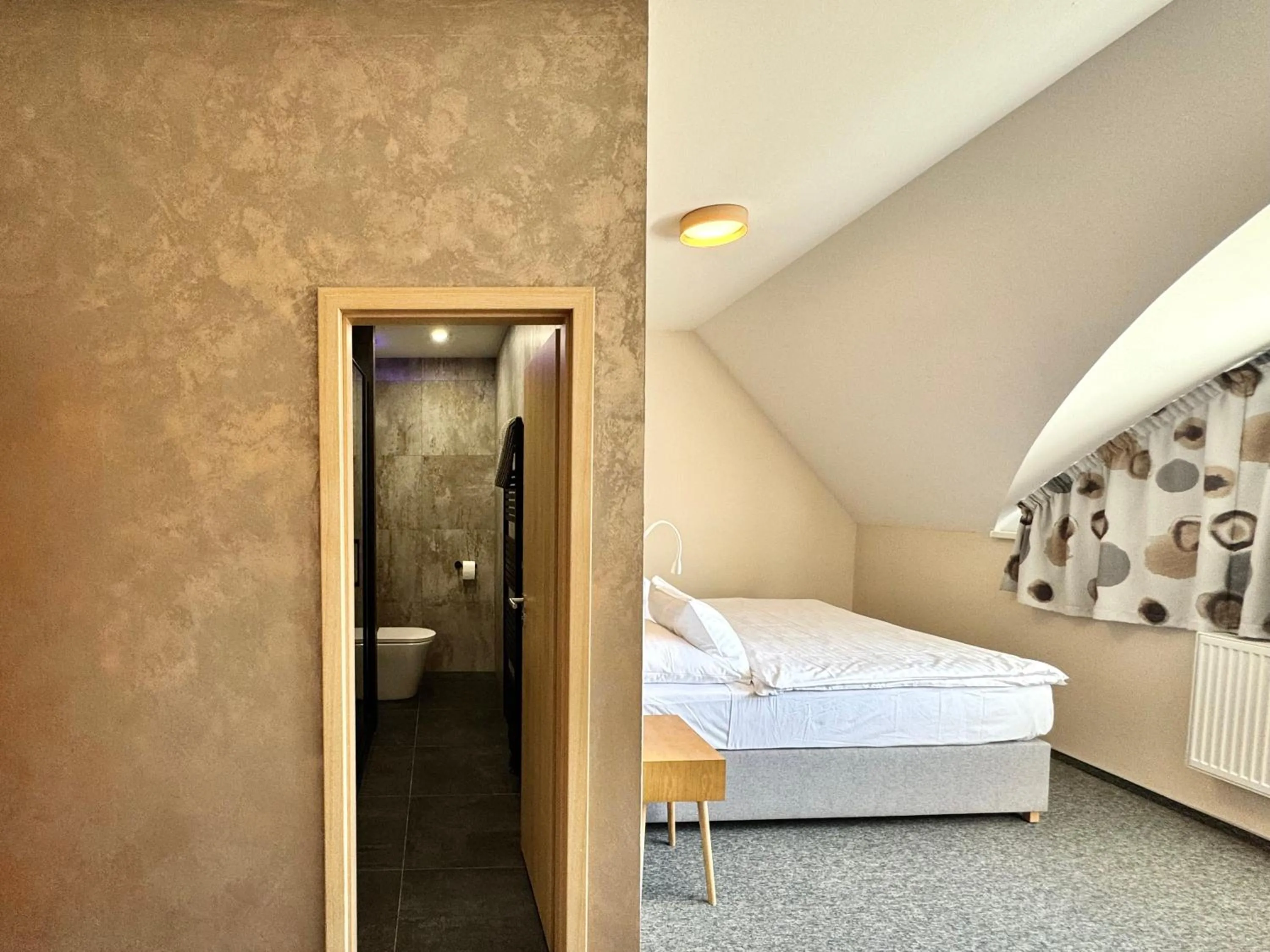 Bed in Hotel U Vlašského Dvora