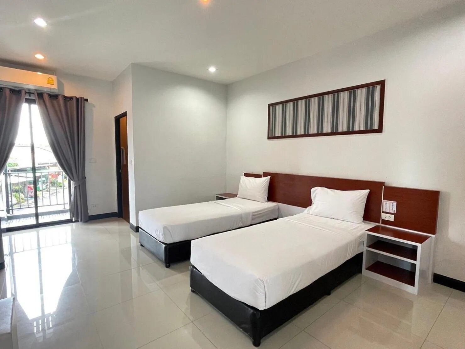 Bed in River Hotel Pattani