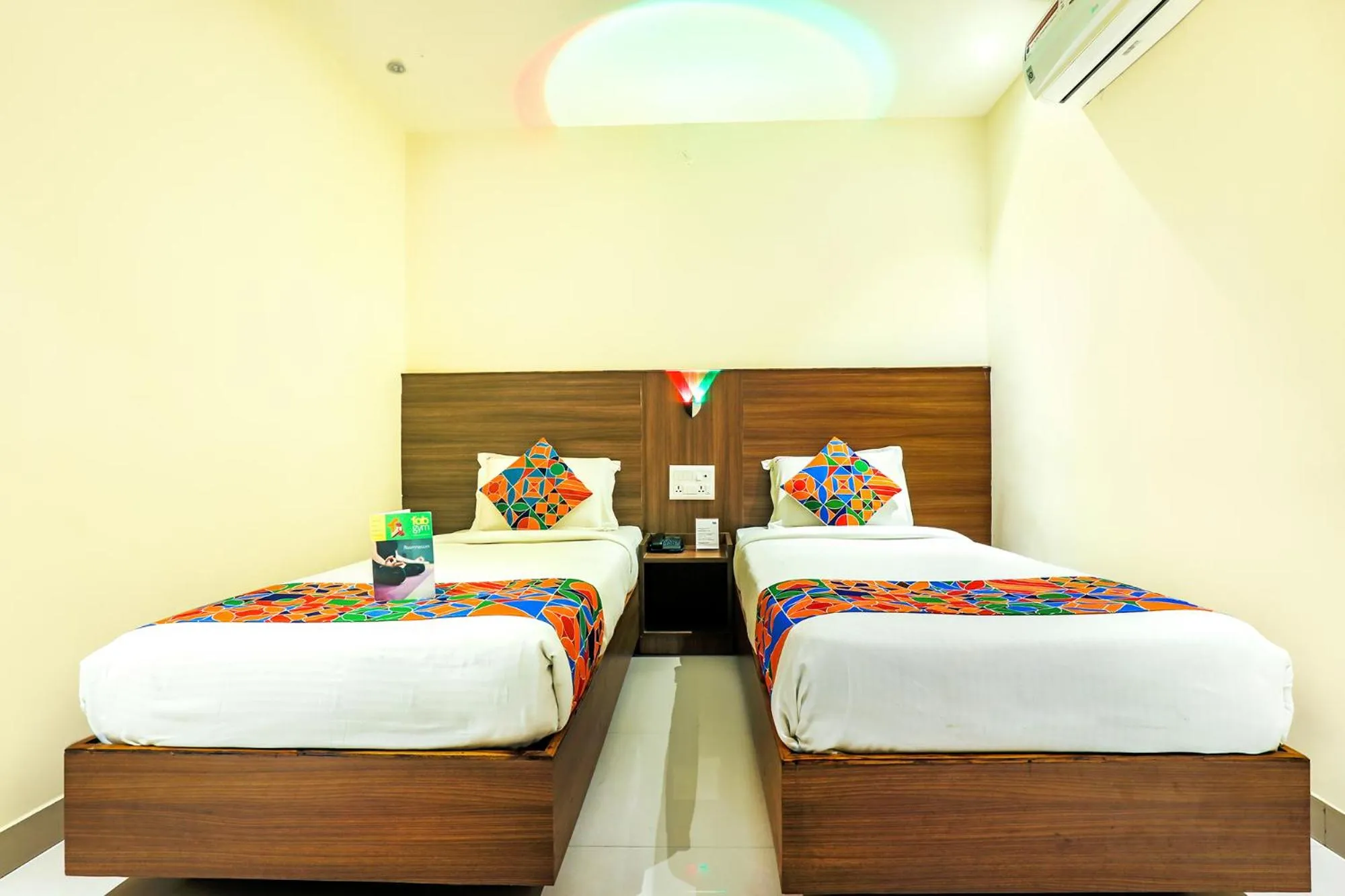 Bed in FabHotel RR Grand - Next to Trendset Mall