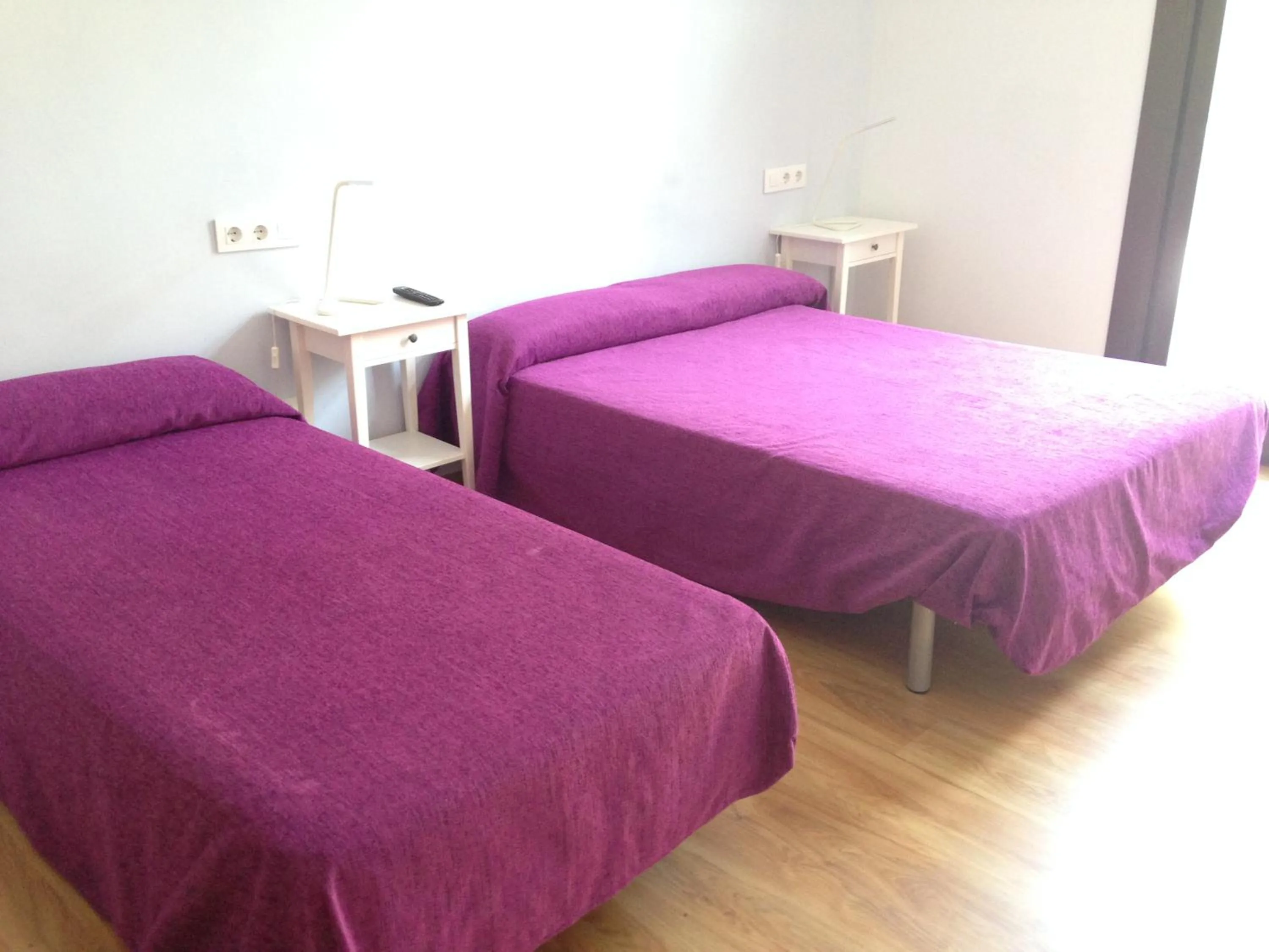 Photo of the whole room, Bed in Hostal Delfos