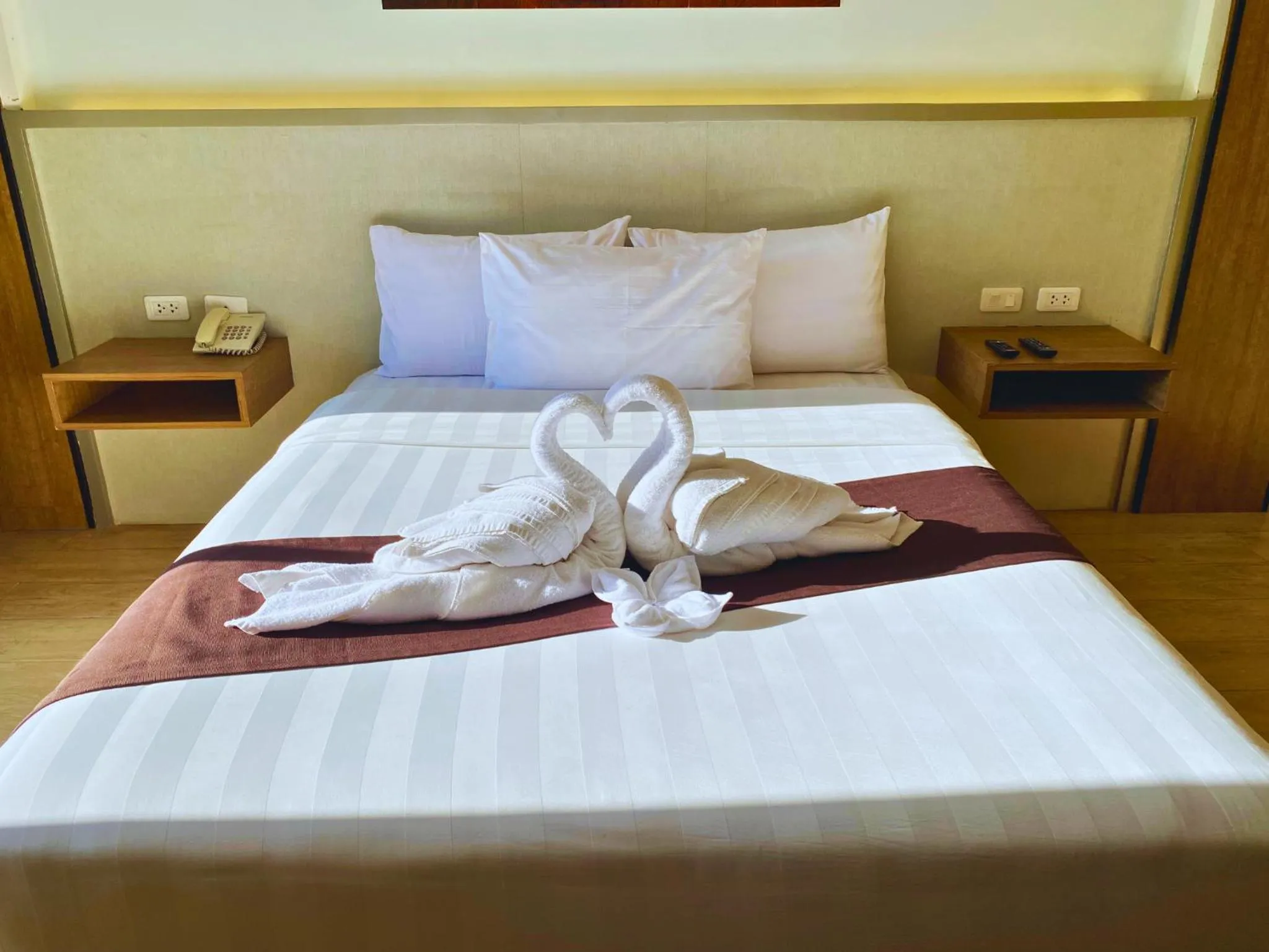 Bed in Aquamira Hotel & Resort