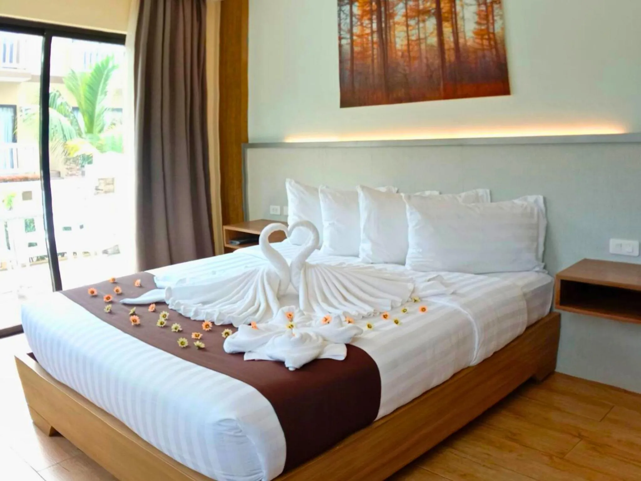 Bed in Aquamira Hotel & Resort