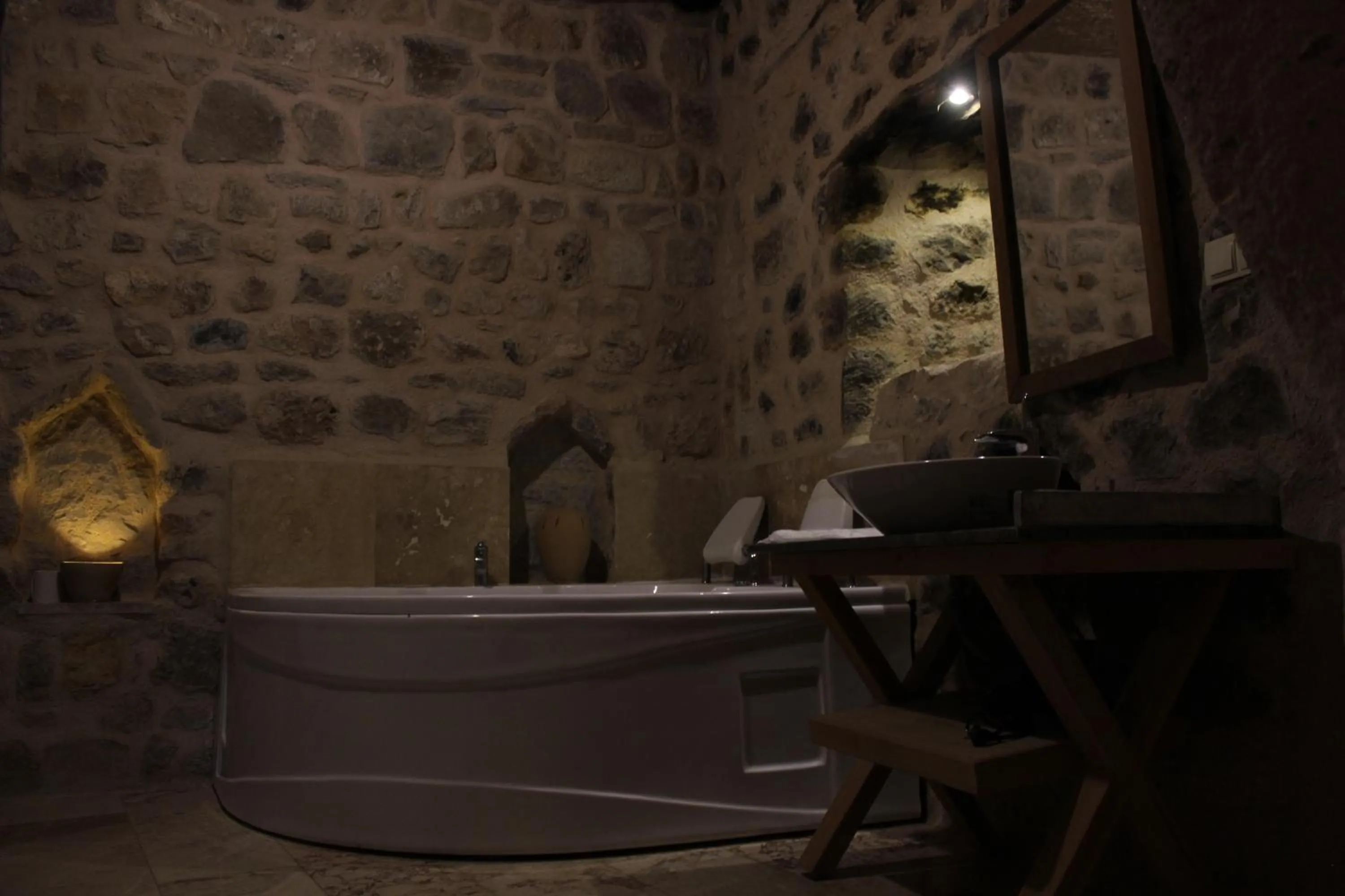 Bathroom in Helike Cave Suites