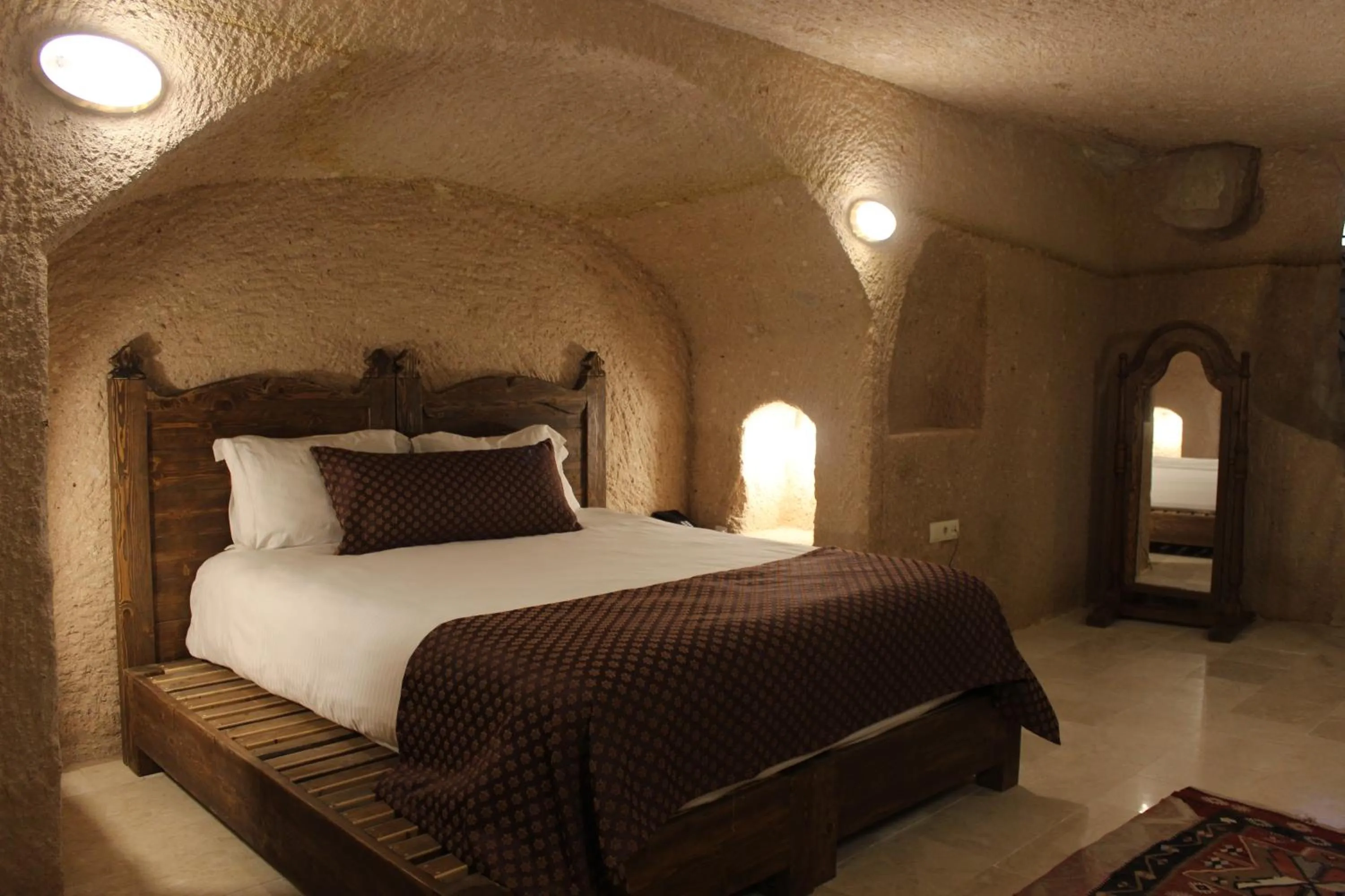 Property building, Bed in Helike Cave Suites