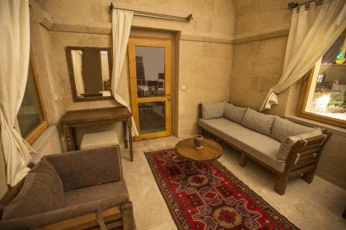 Seating area in Helike Cave Suites