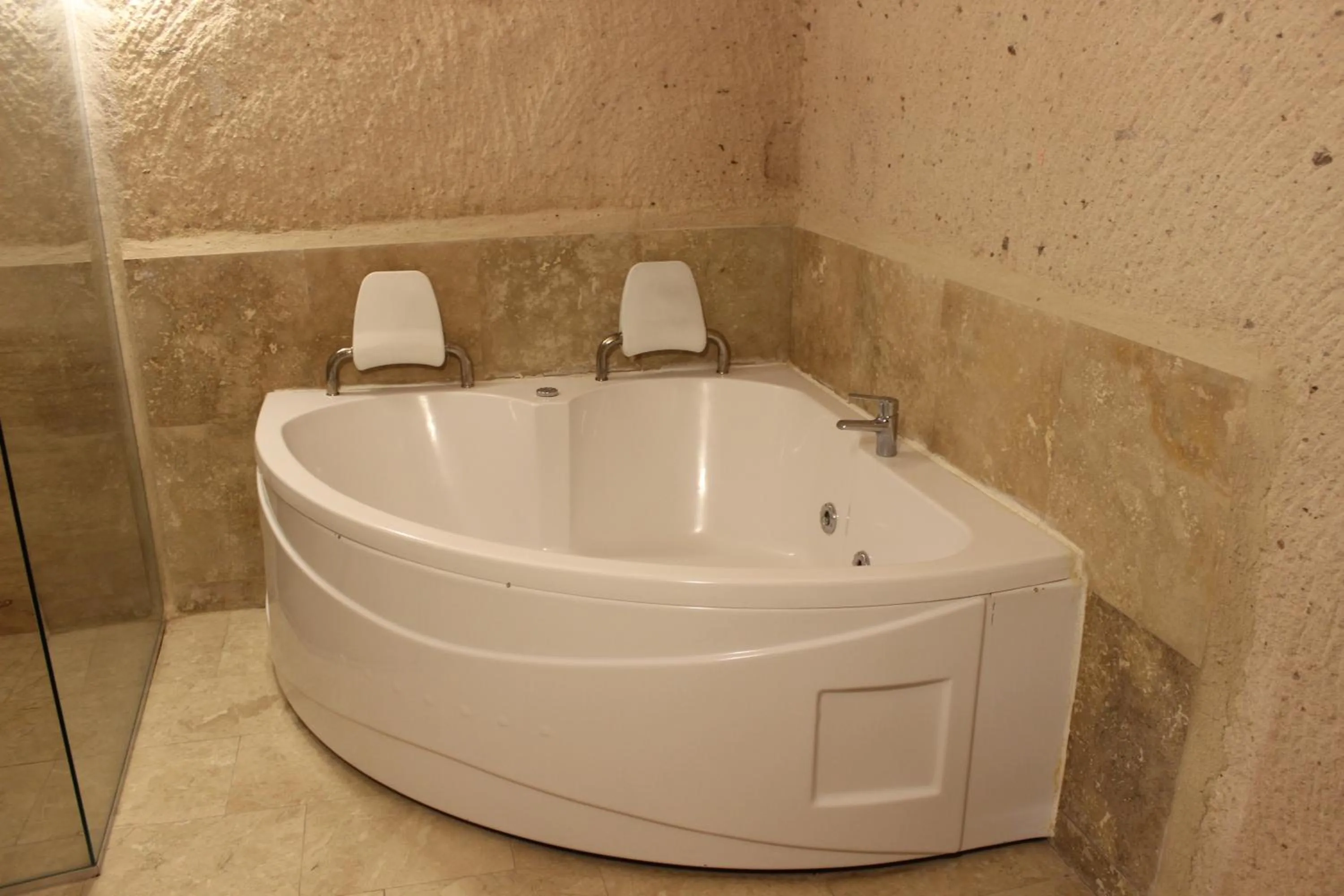 Hot Tub in Helike Cave Suites