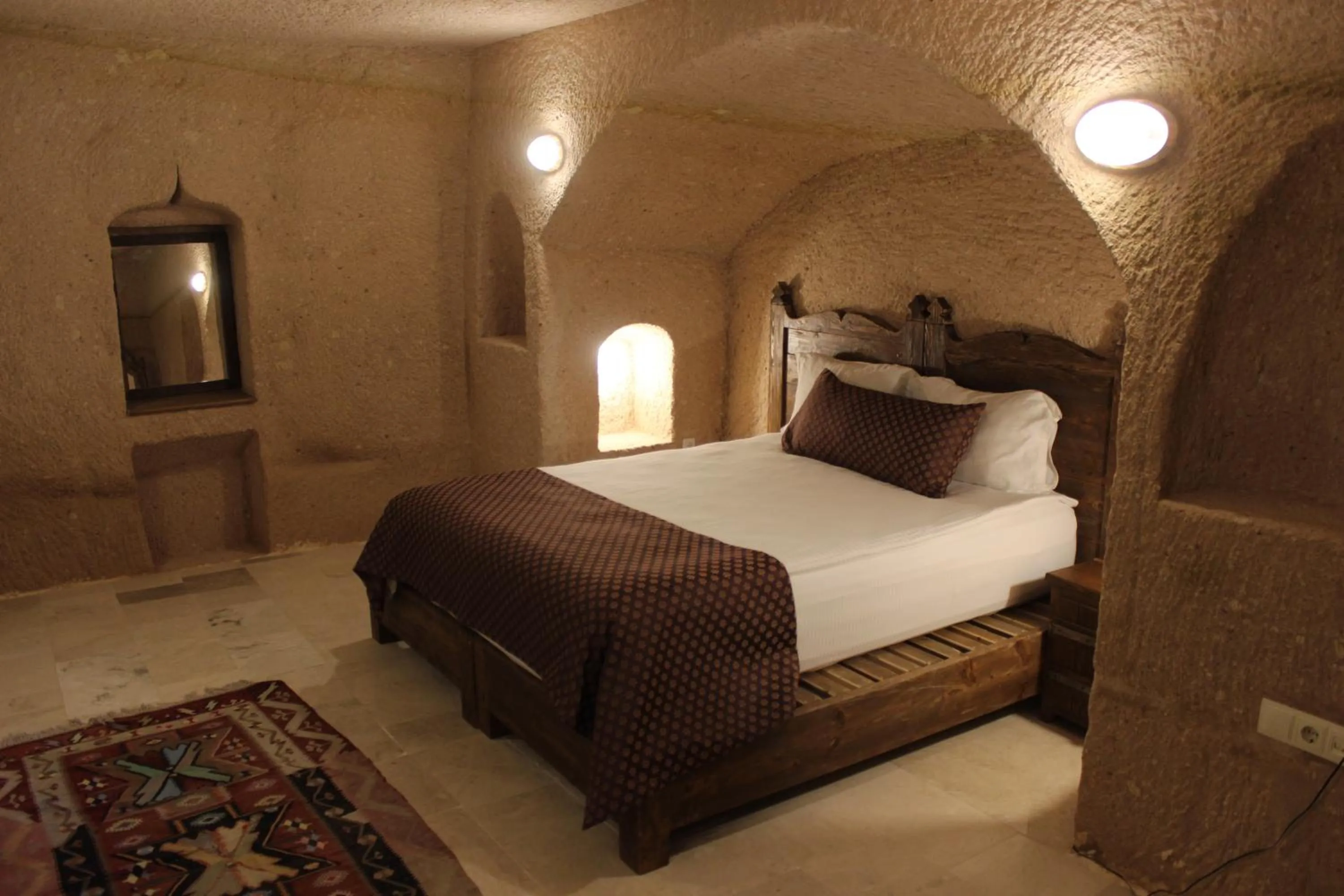 Property building, Bed in Helike Cave Suites