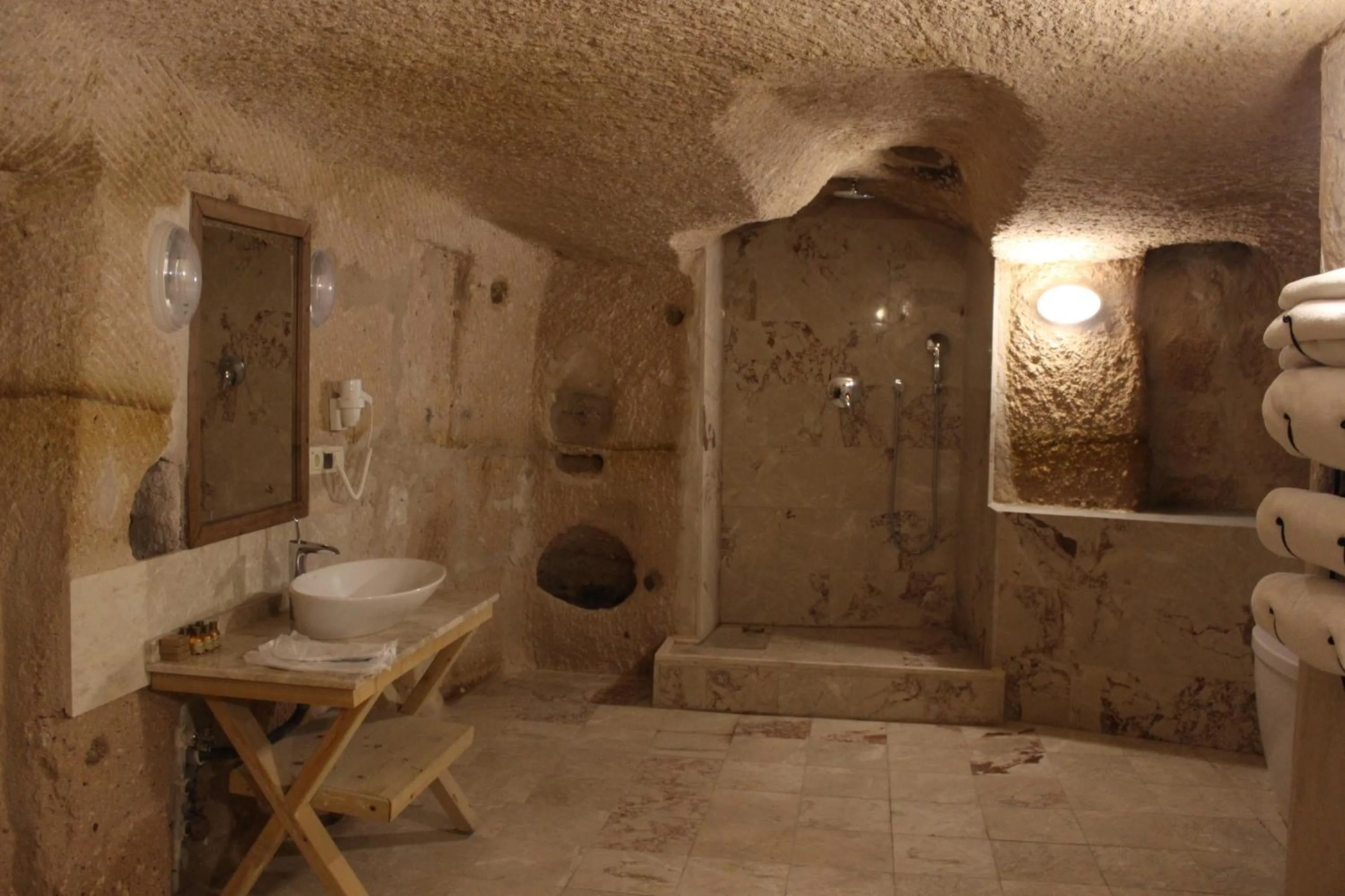Shower in Helike Cave Suites