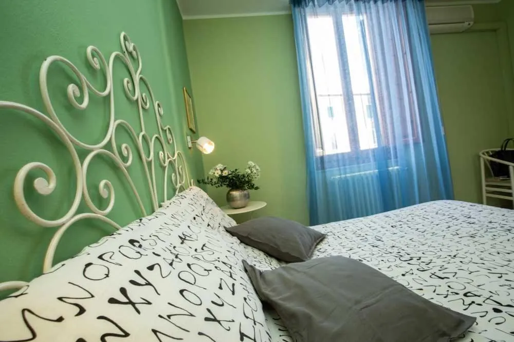 Bed in Albergo Alassio