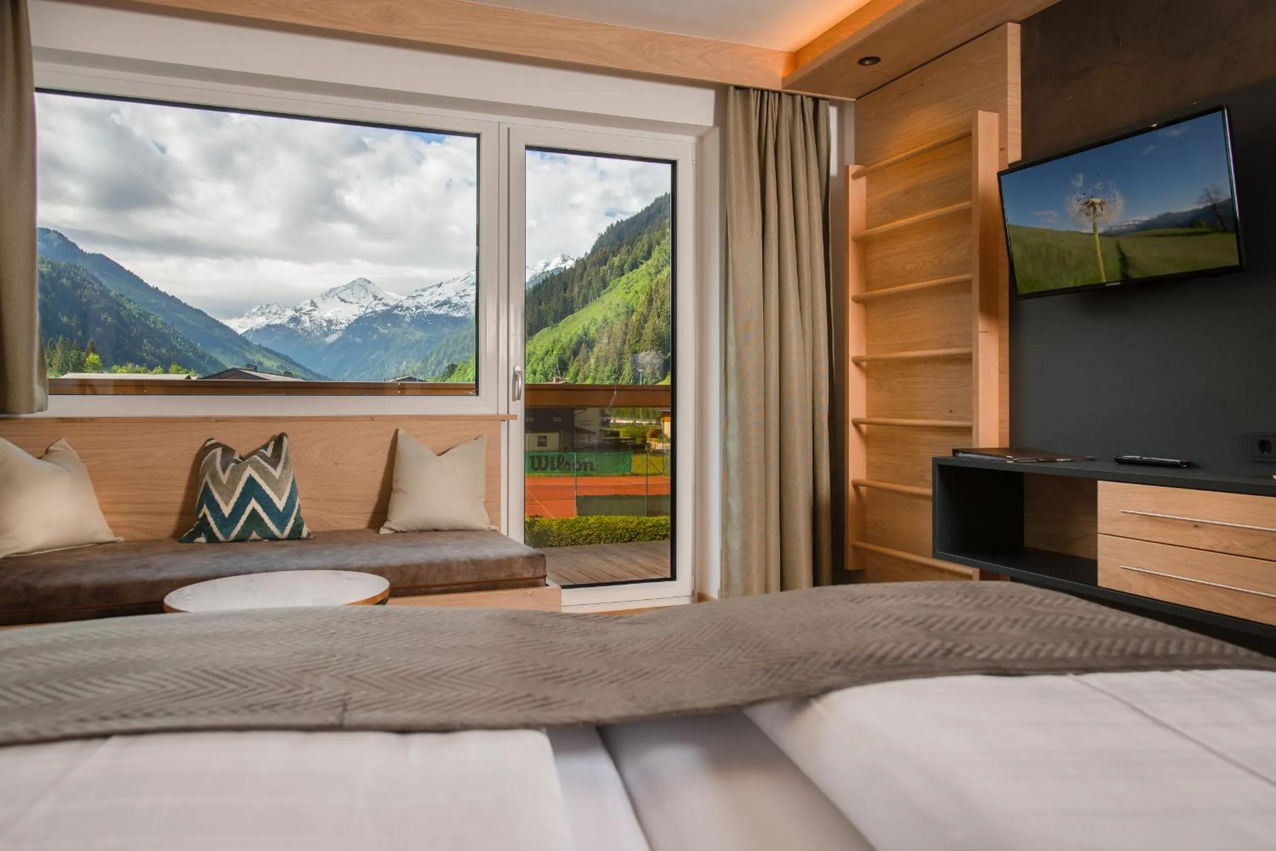 Bed in Hotel Alpina