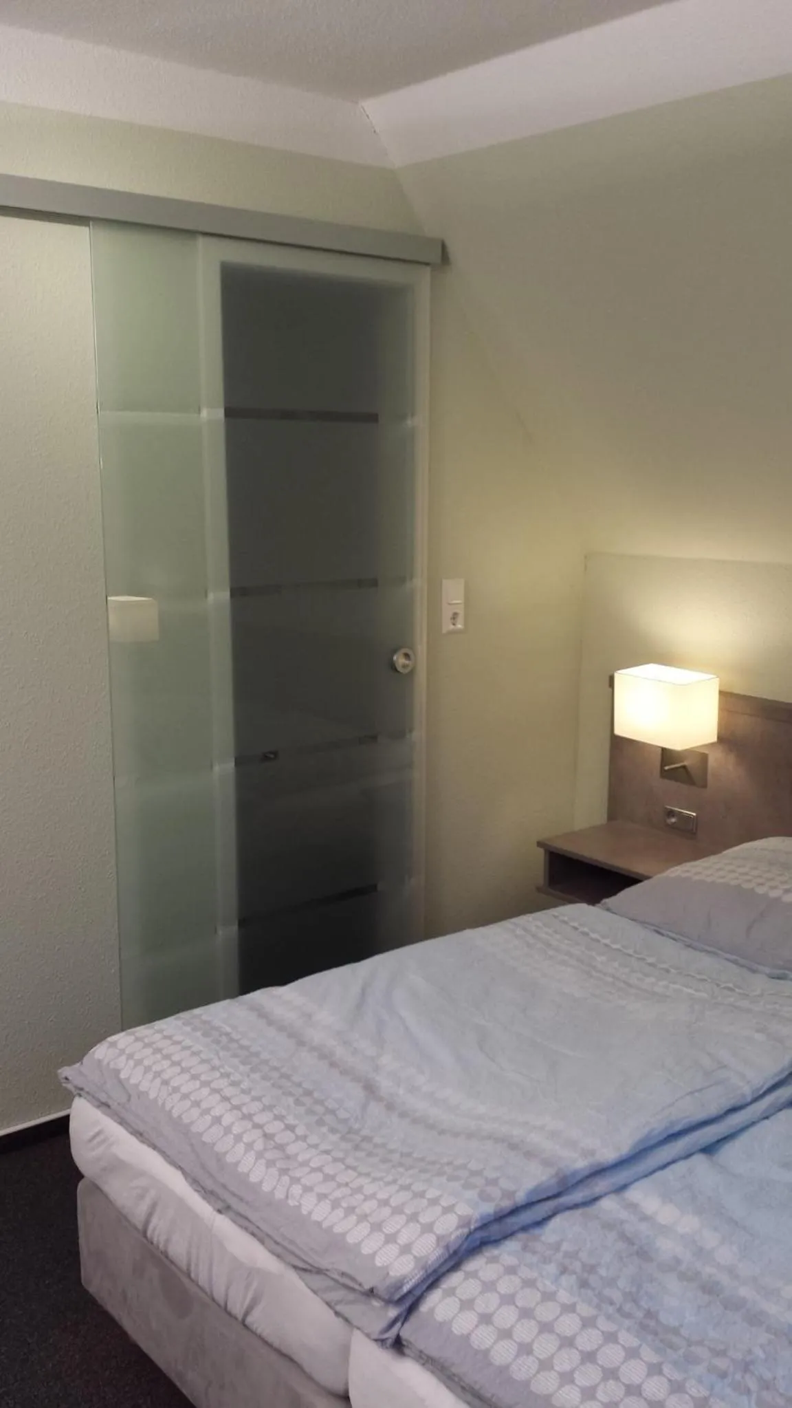 Bed in Hotel Landhaus Leuchtfeuer Nordseeinsel Pellworm