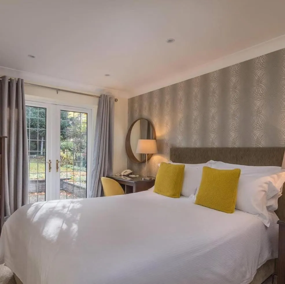 Bed in The Stanwick Hotel