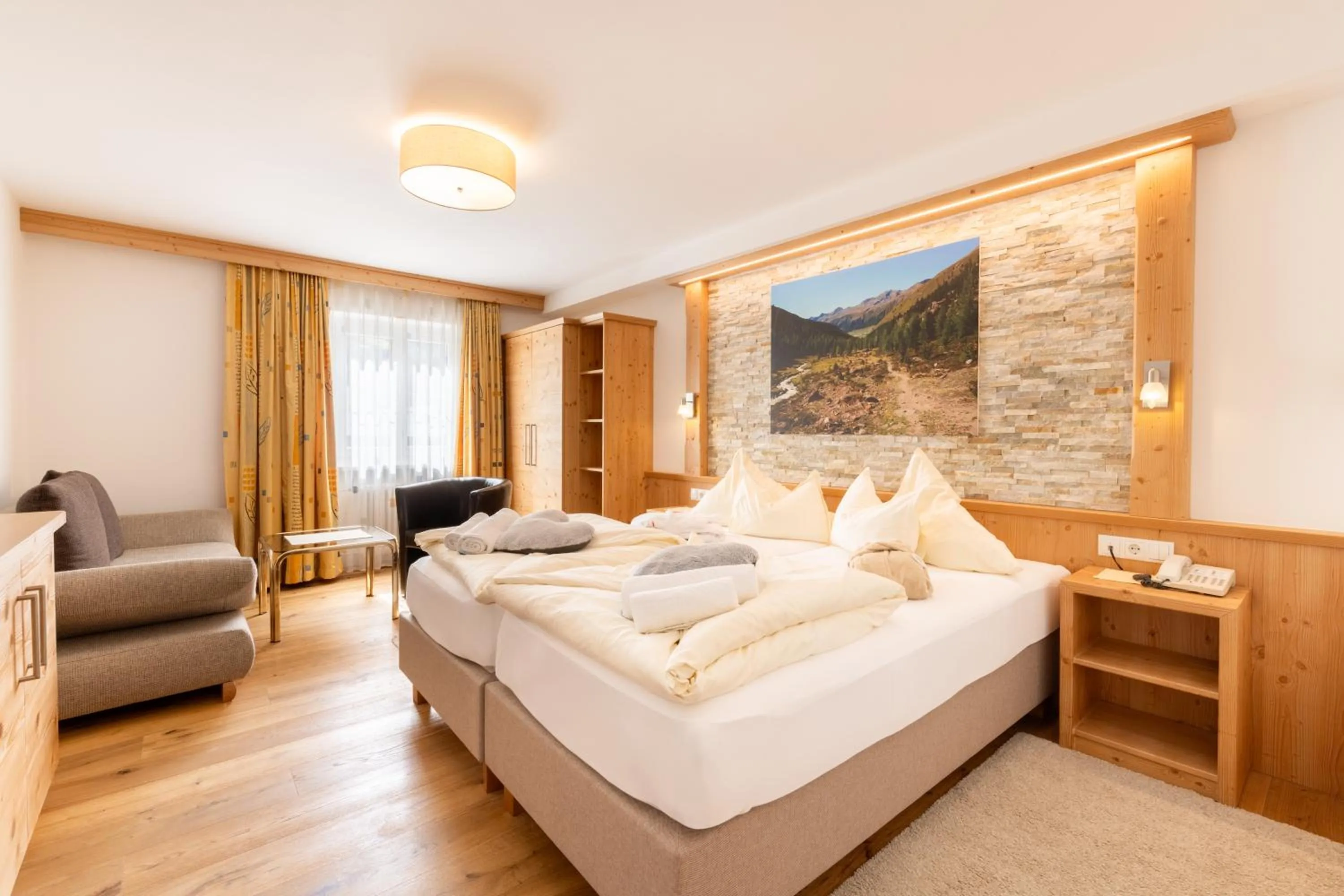 Photo of the whole room, Bed in Beauty & Wellness Hotel Tirolerhof