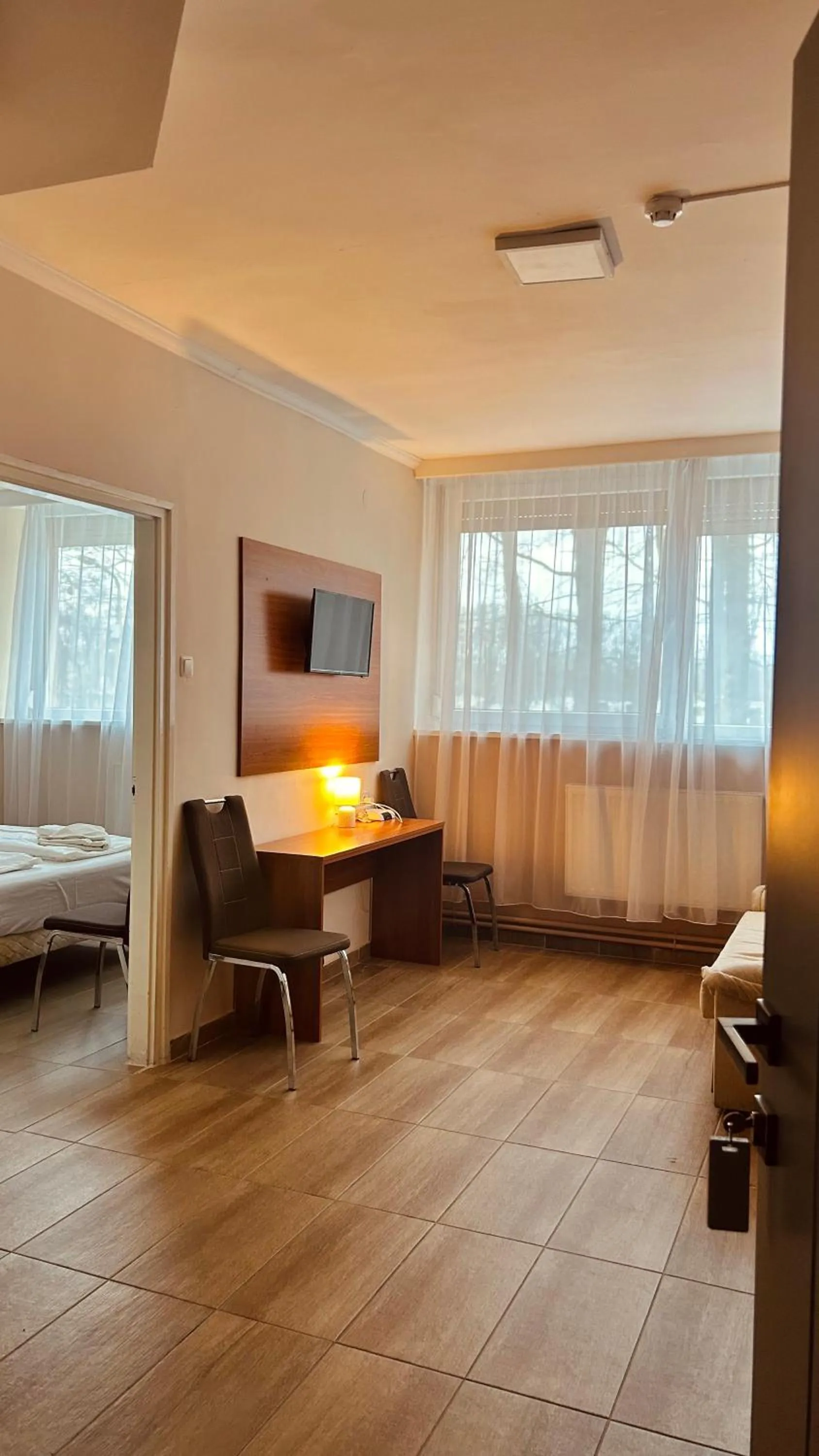 Living room, Bed in Öreg-tó Hotel és Rendezvénytér