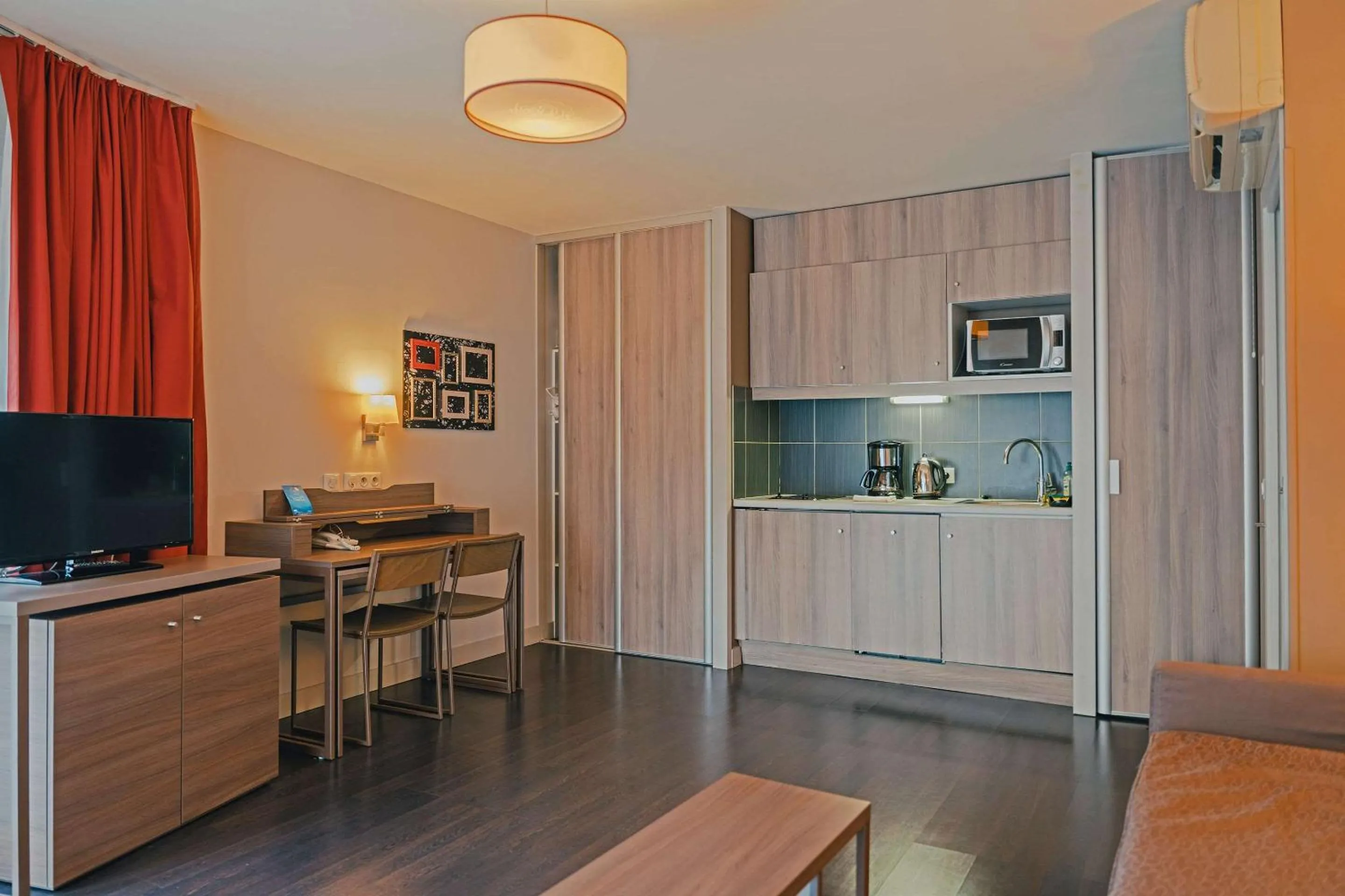 Bedroom in Comfort Aparthotel Saint-Etienne