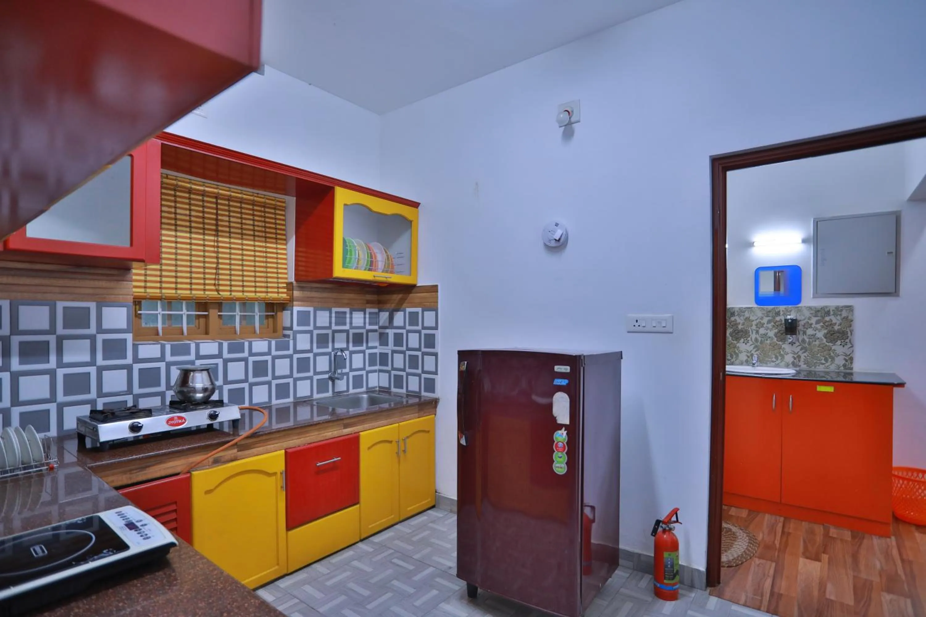 Kitchen or kitchenette in Arabian Nights Munnar Pool Villa