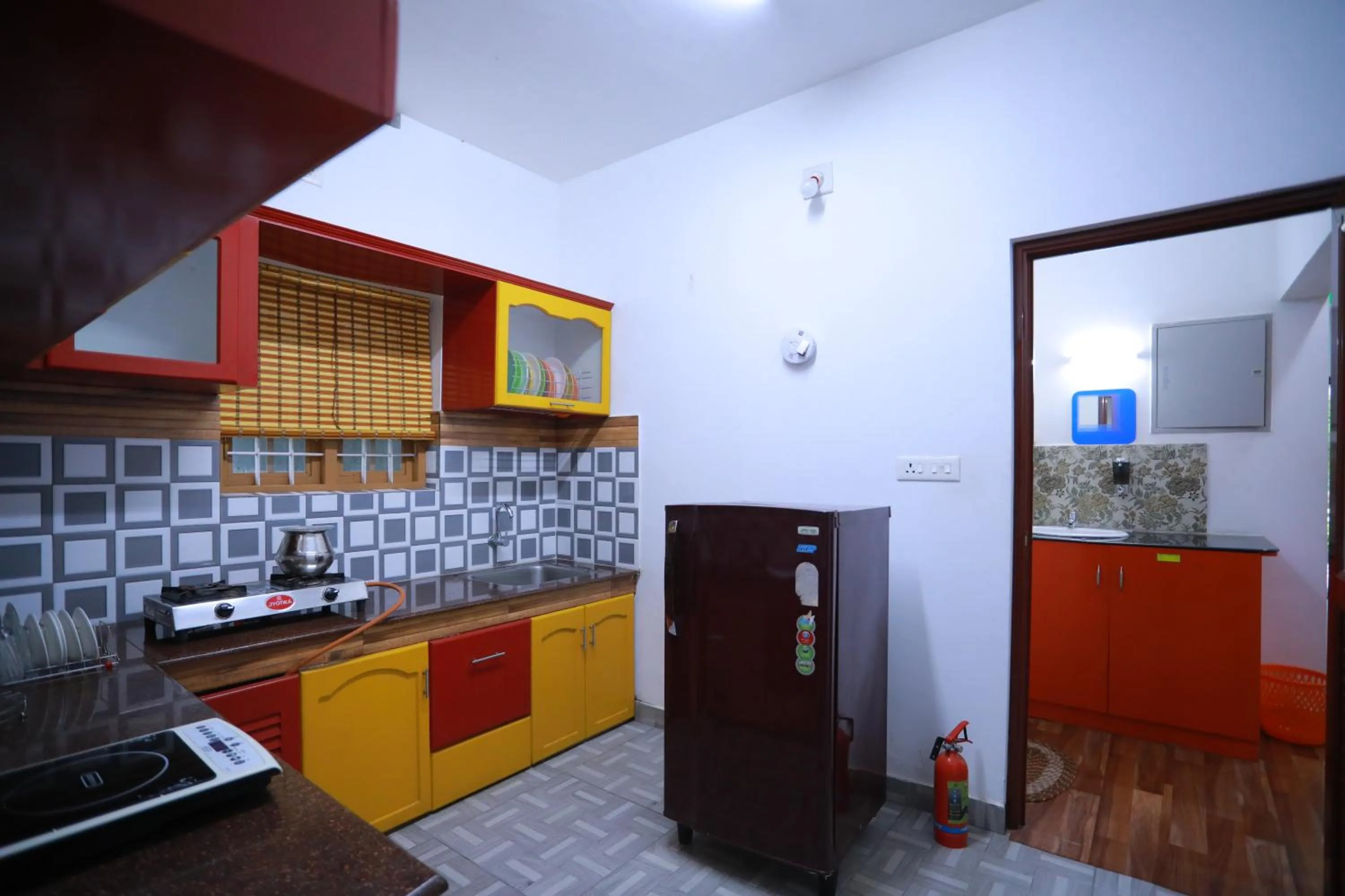 Kitchen or kitchenette in Arabian Nights Munnar Pool Villa
